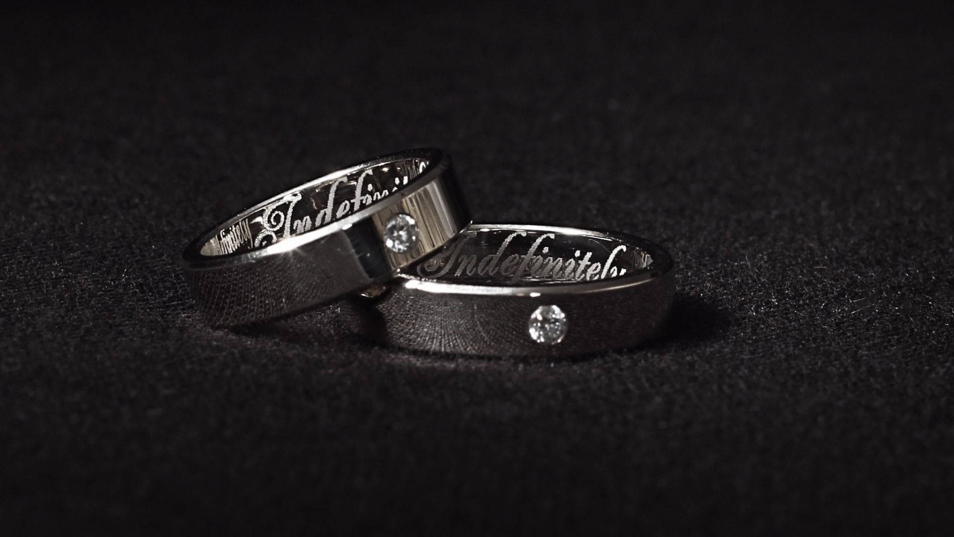 Wedding Rings With Small Stone Background