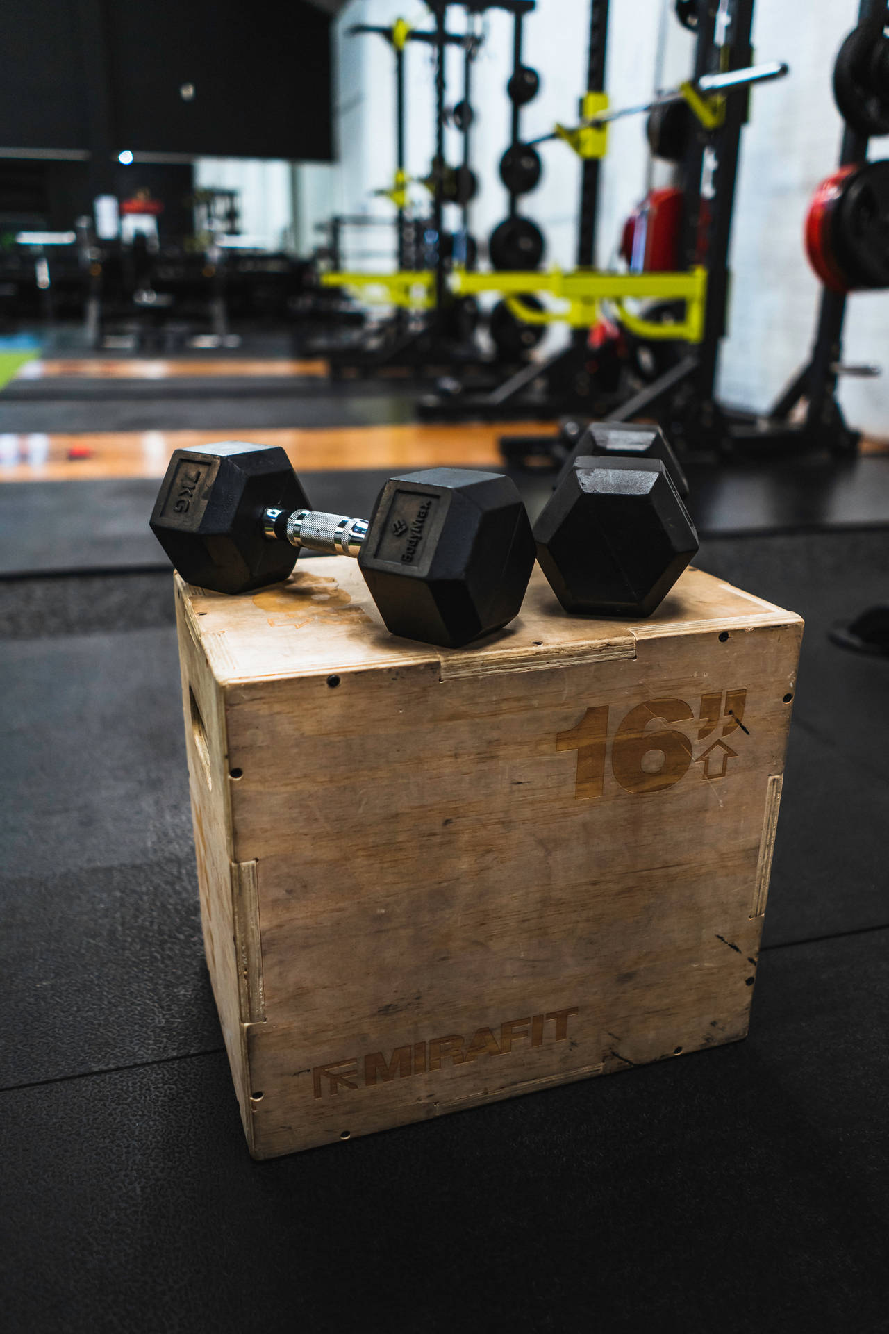 Weightlifting Dumbbells On Wooden Crate Background