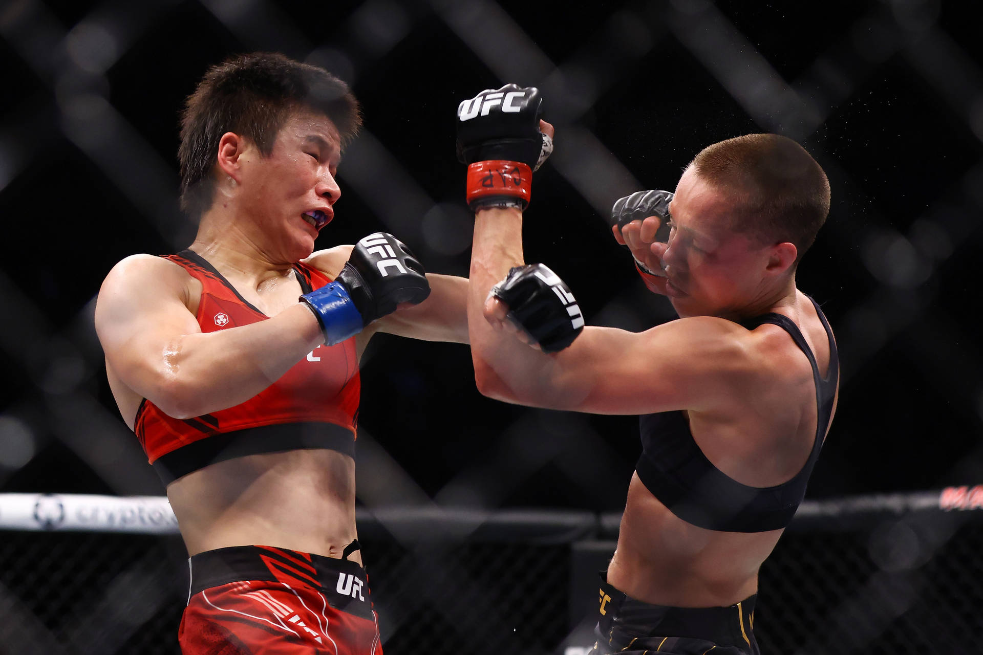 Weili Zhang Against Rose Namajunas Background