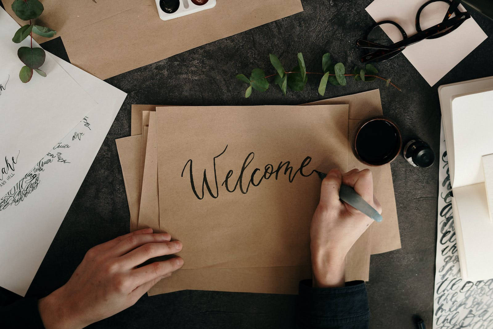 Welcome On Brown Paper Background