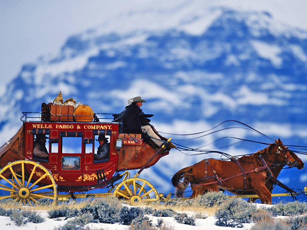 Wells Fargo Carriage In Snow Background