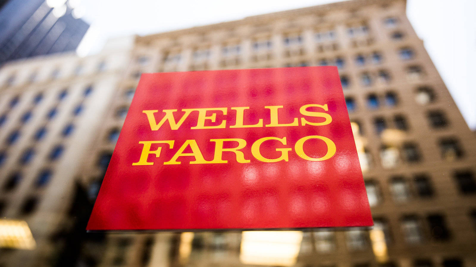 Wells Fargo Logo Overlaid On Building Background