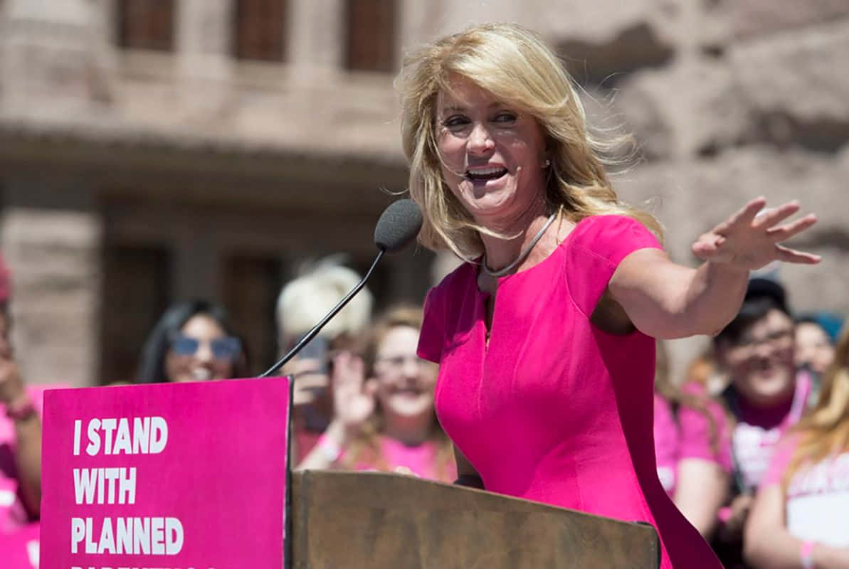 Wendy Davis Delivering Powerful Speech On Women's Rights Background