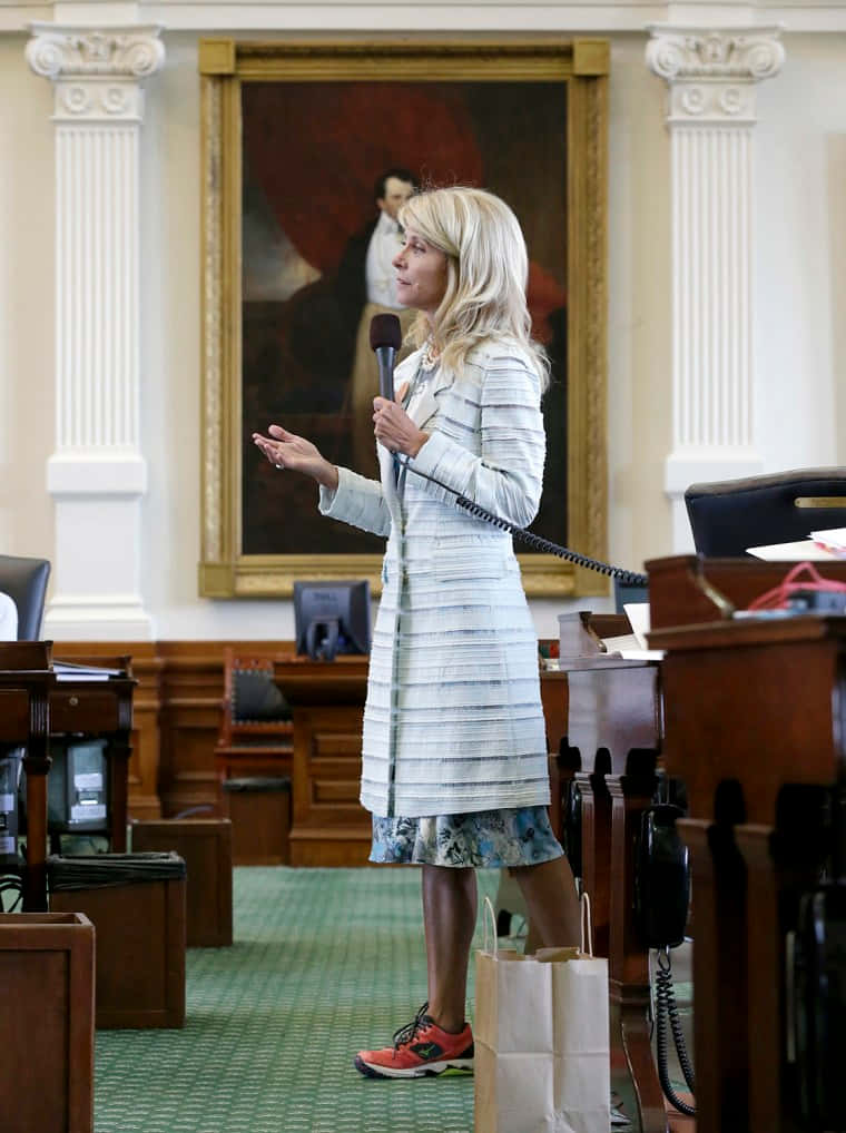 Wendy Davis In Pink Sneakers Background