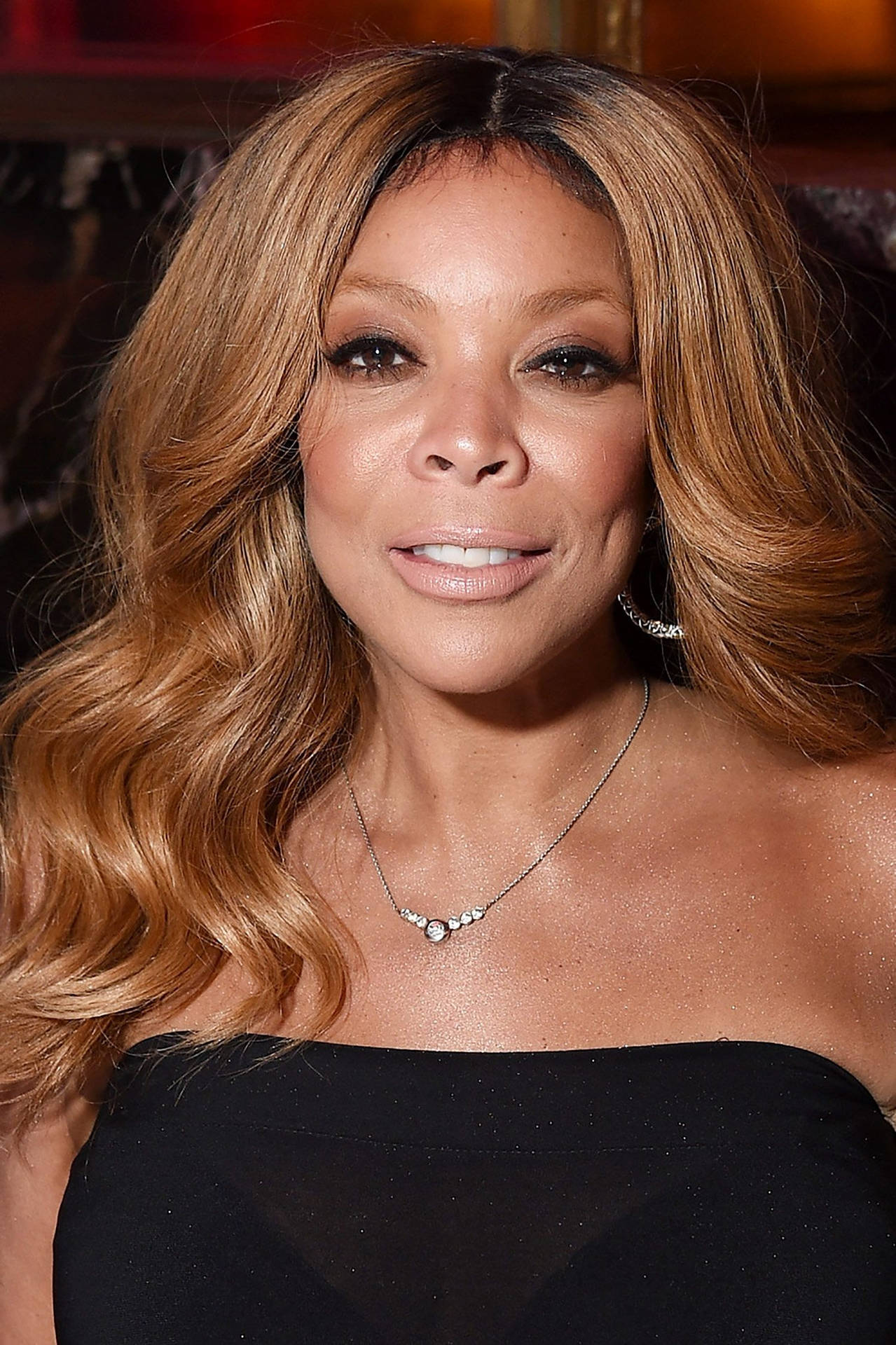 Wendy Williams Lowcut Dress Background