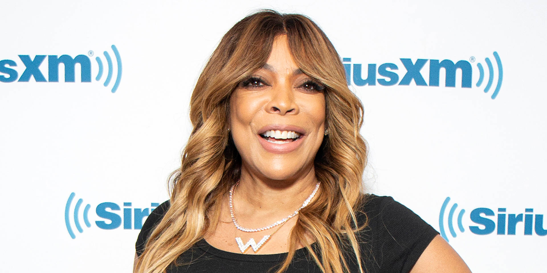 Wendy Williams With W Necklace Background