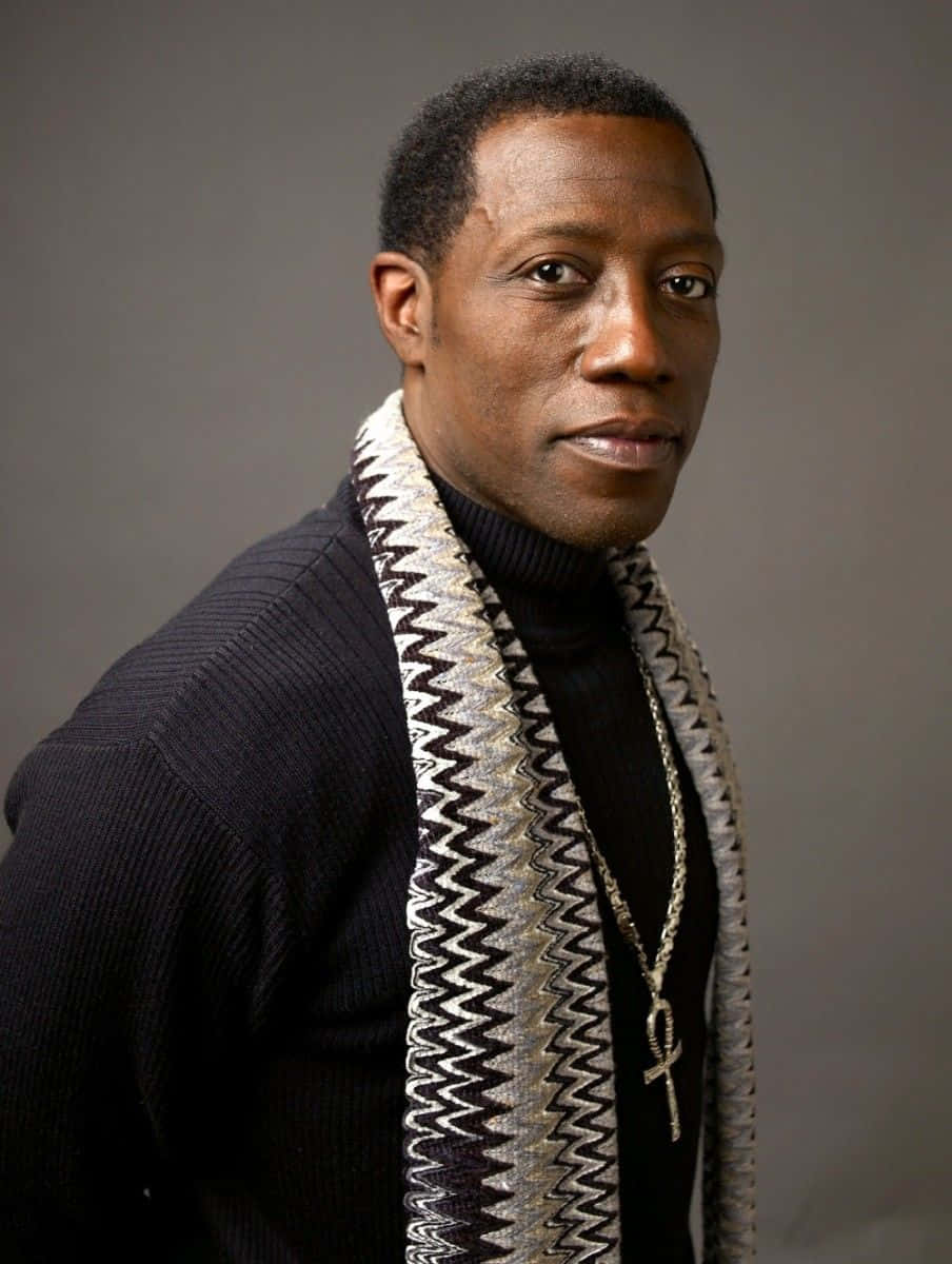 Wesley Snipes Exuding Confidence In An Intense Portrait Background