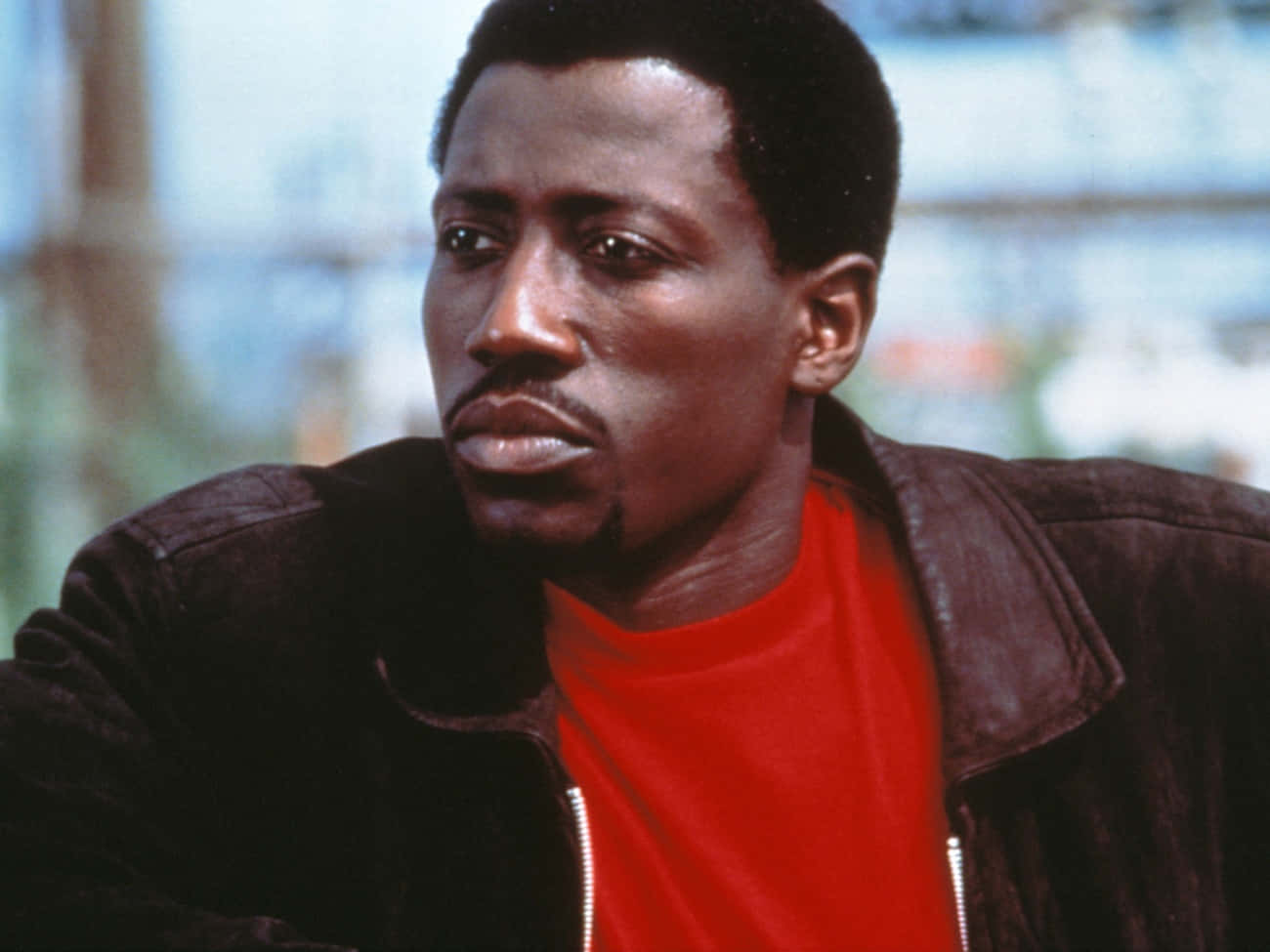 Wesley Snipes In An Intense Action Pose Background