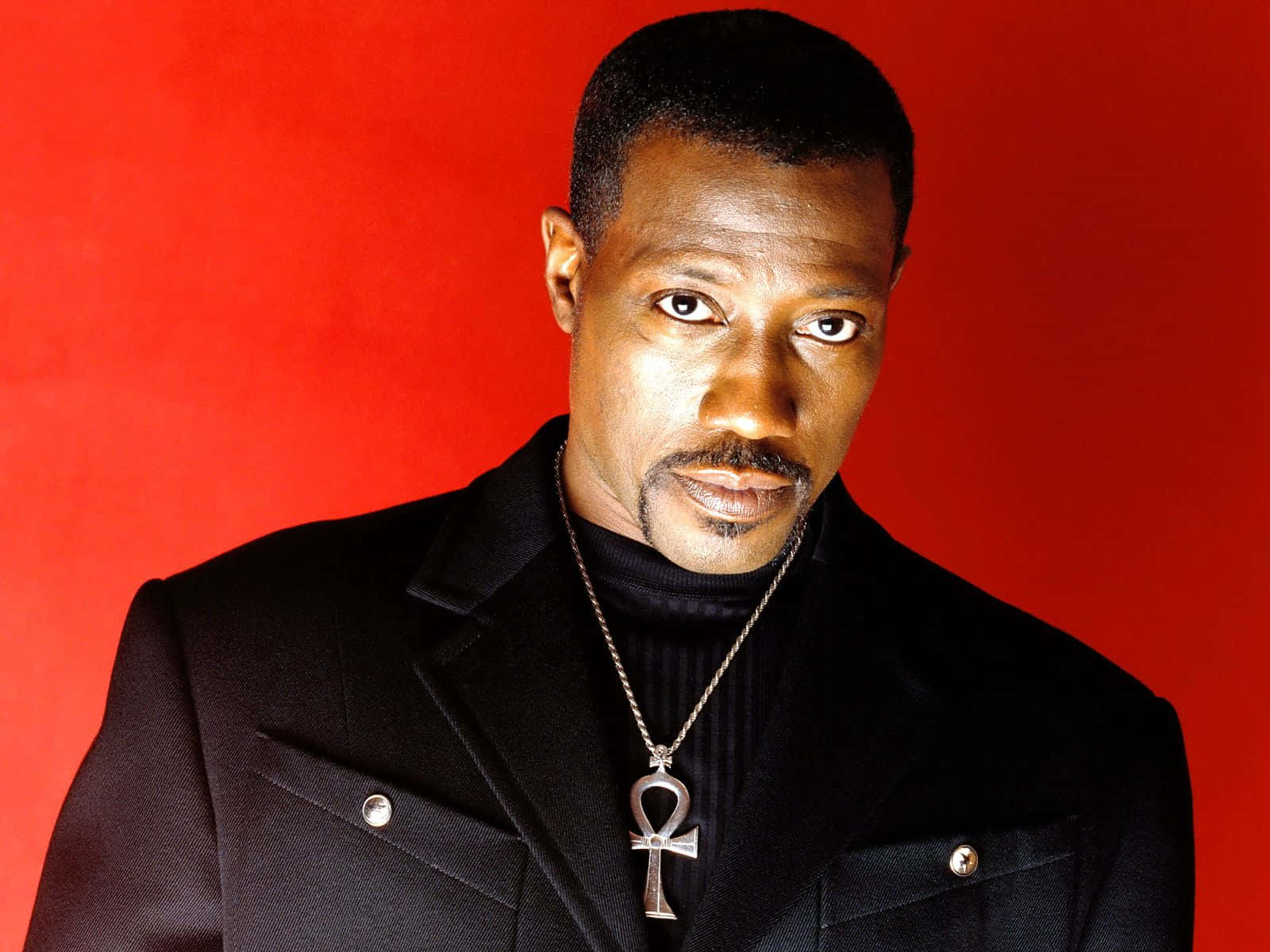 Wesley Snipes In Stylish Attire Background