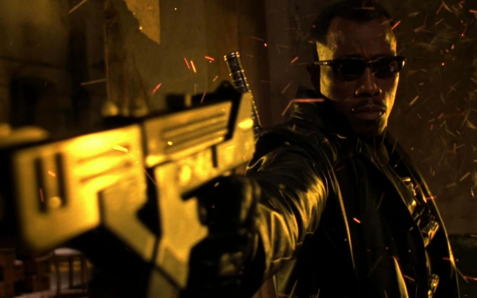 Wesley Snipes Striking A Pose In A Sleek Outfit Background