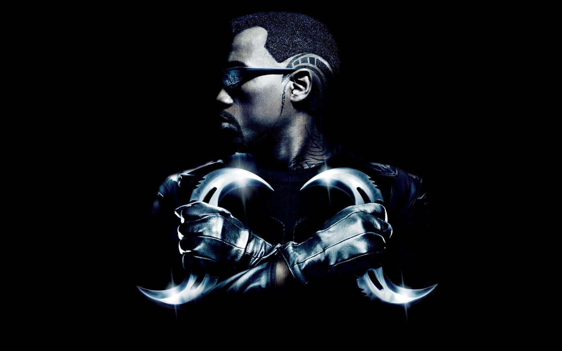 Wesley Snipes Striking A Powerful Pose In A Dynamic Setting. Background