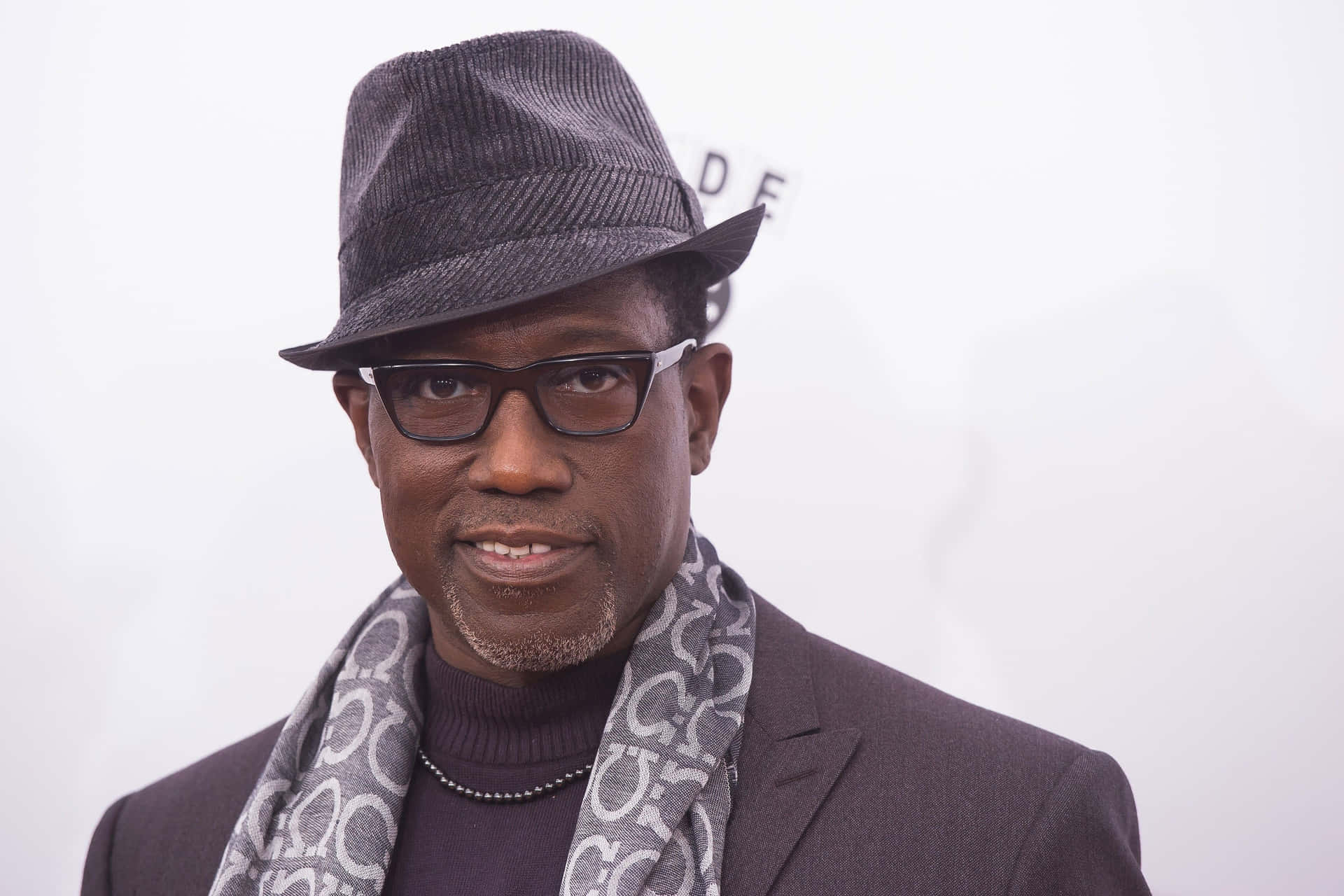 Wesley Snipes Striking A Powerful Pose In A High-resolution Wallpaper Background