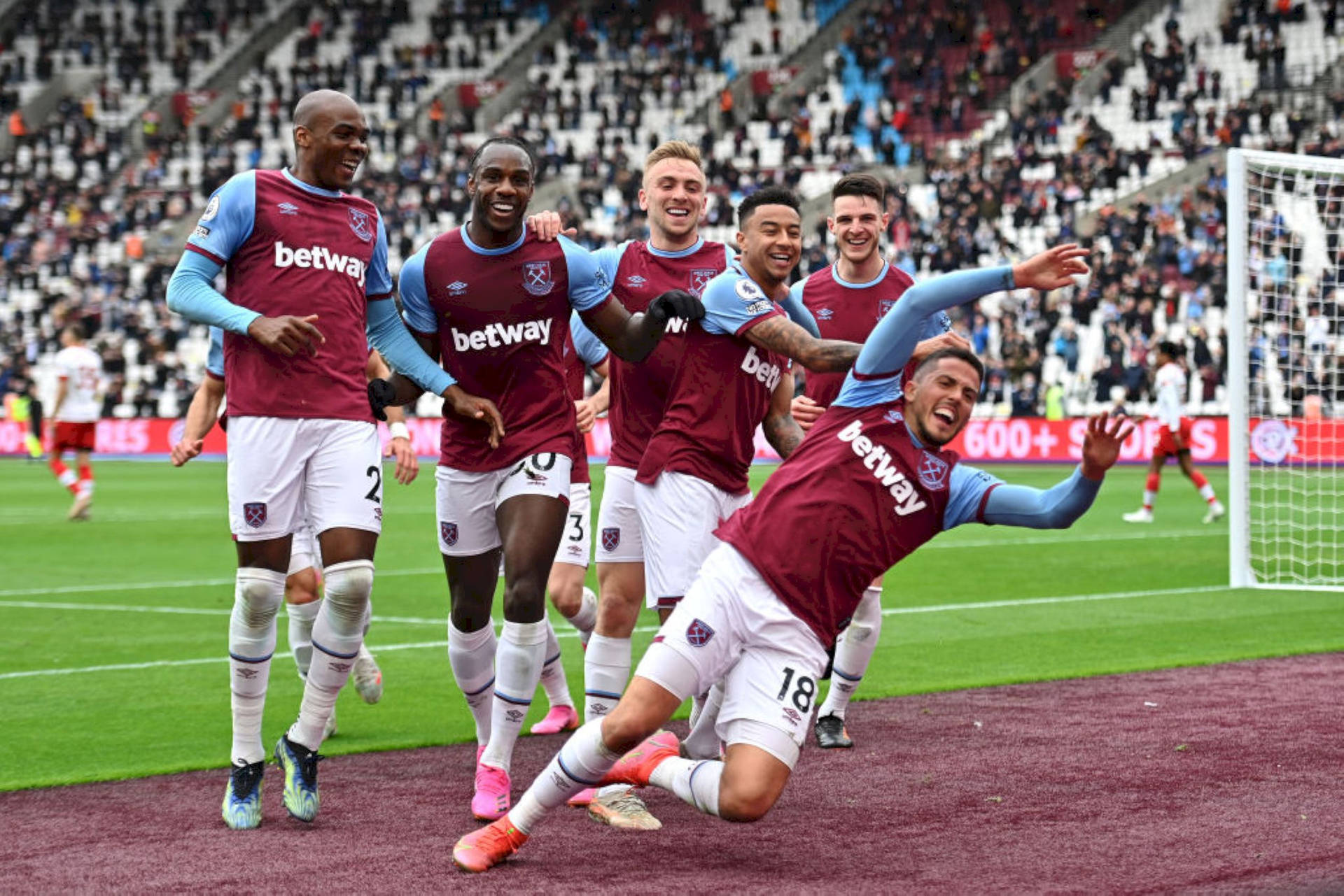 West Ham United Players Celebrating Goal Background