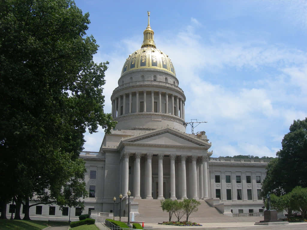 West Virginia And The State's Dome At Its Capitol Building Background