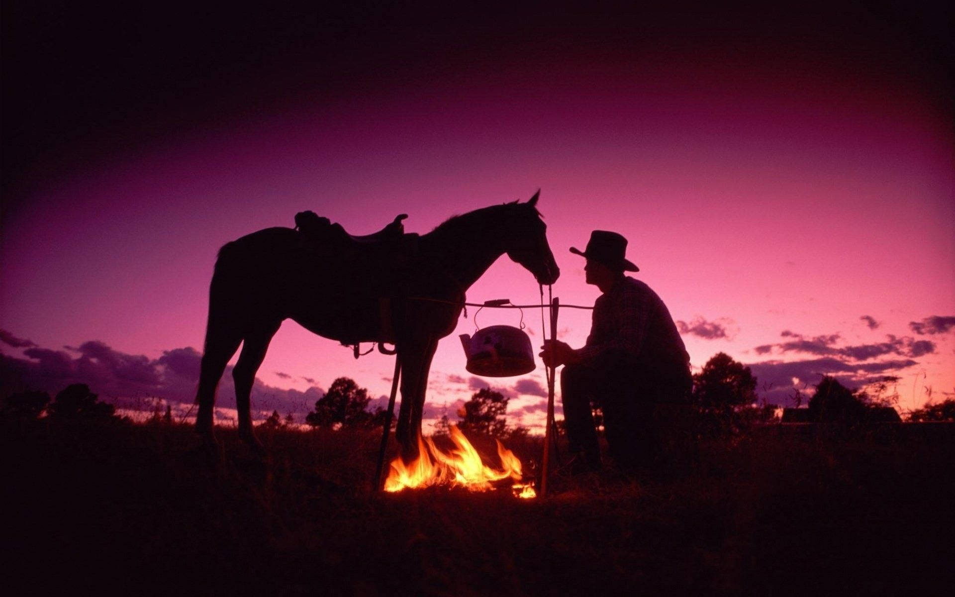 Western Cowboy And Bonfire Background