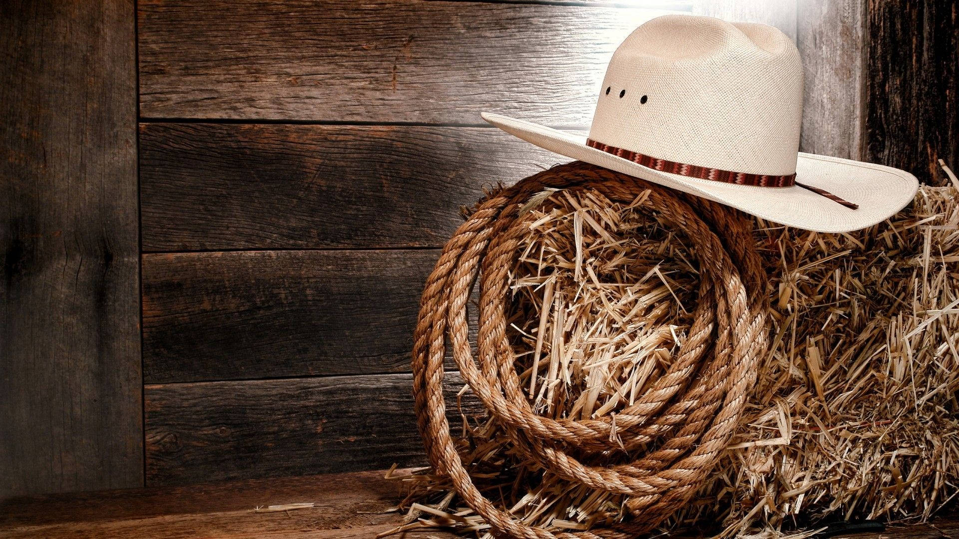 Western Cowboy Hat On Haystack Background