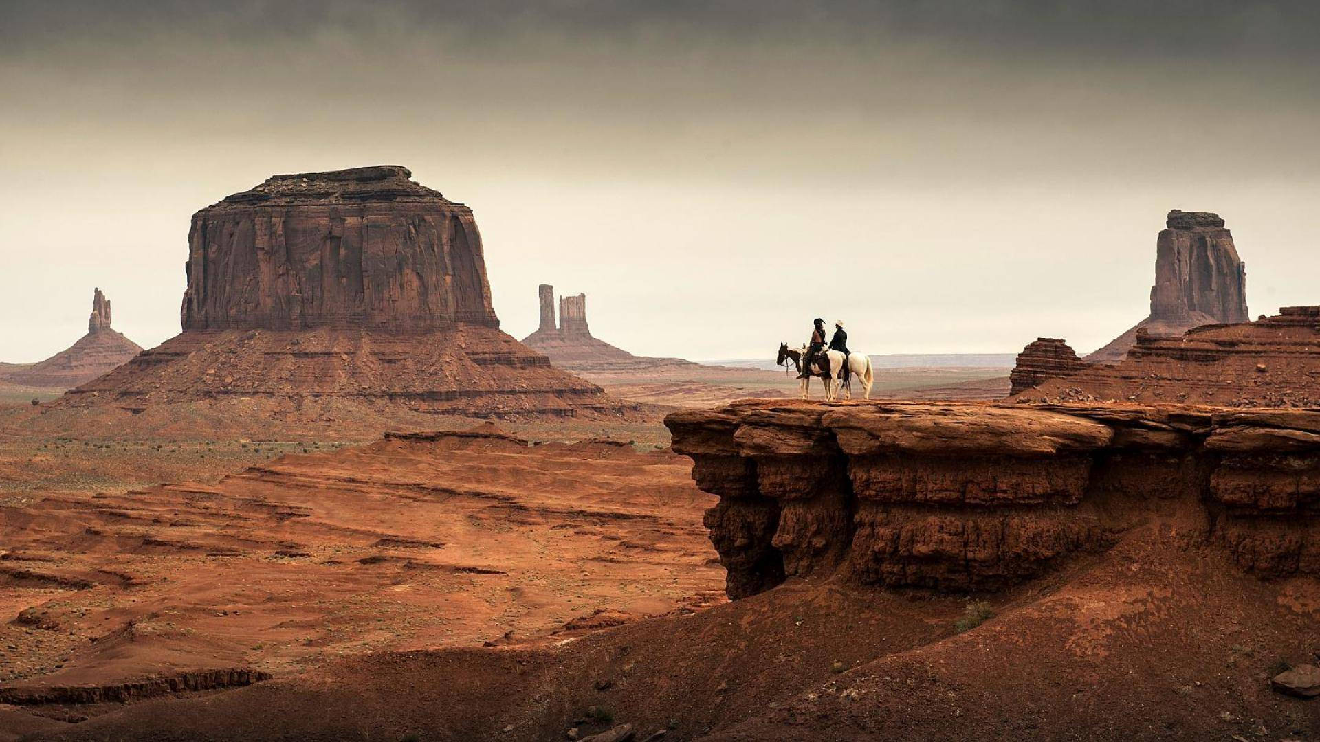 Western Cowboys In Monument Valley