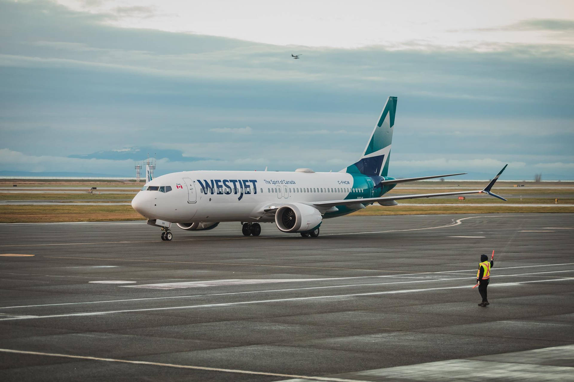 Westjet Airline Preparing To Board Background