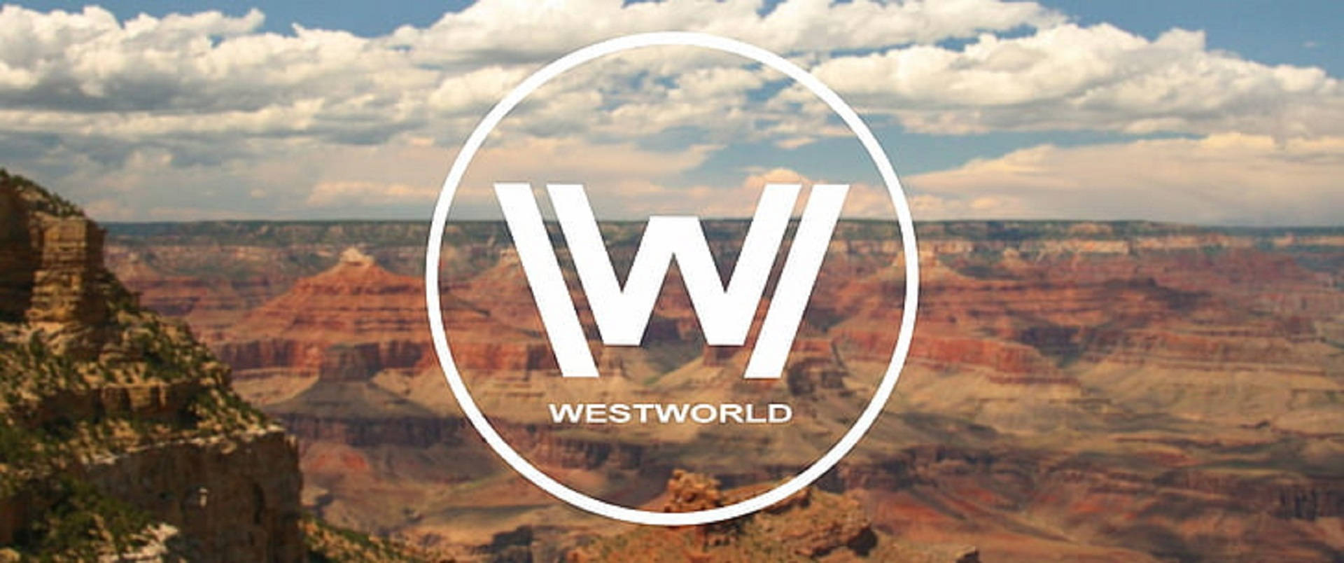 Westworld Logo In Mountain Cliff Background