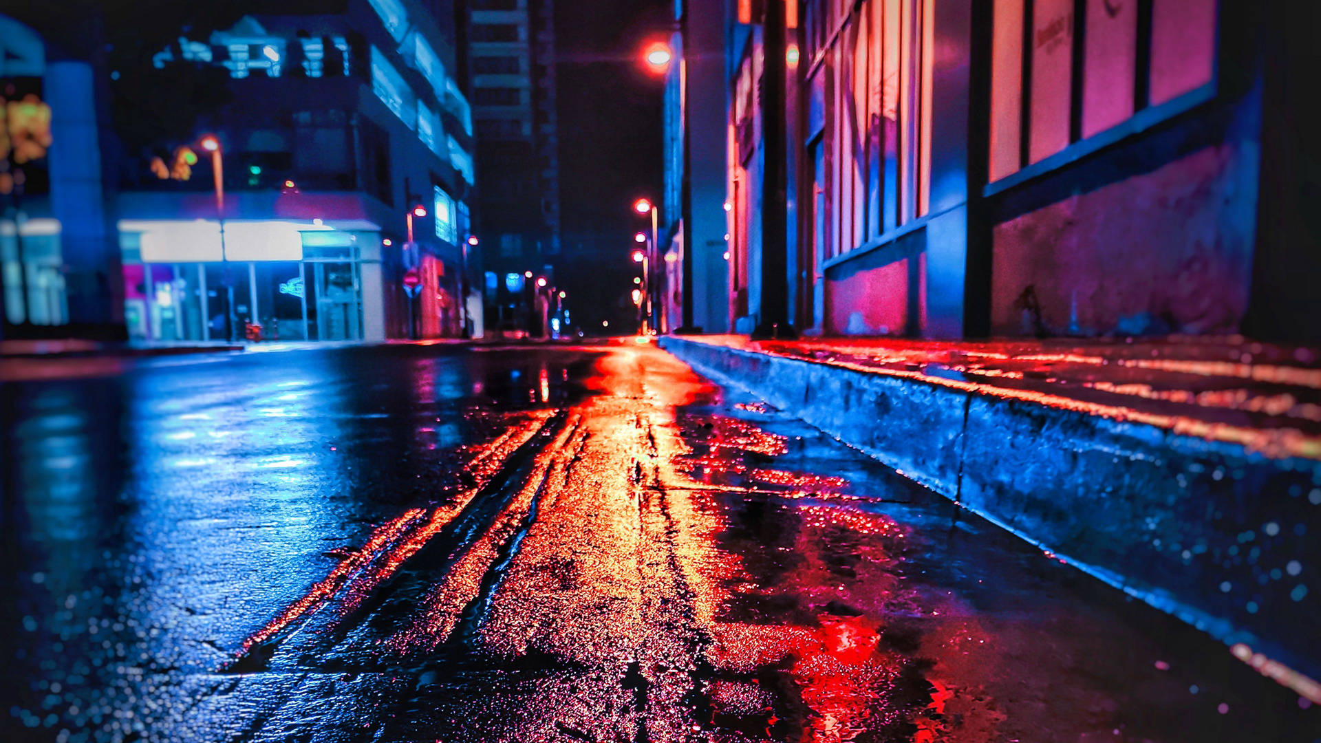 Wet Concrete Road In City At Night Background