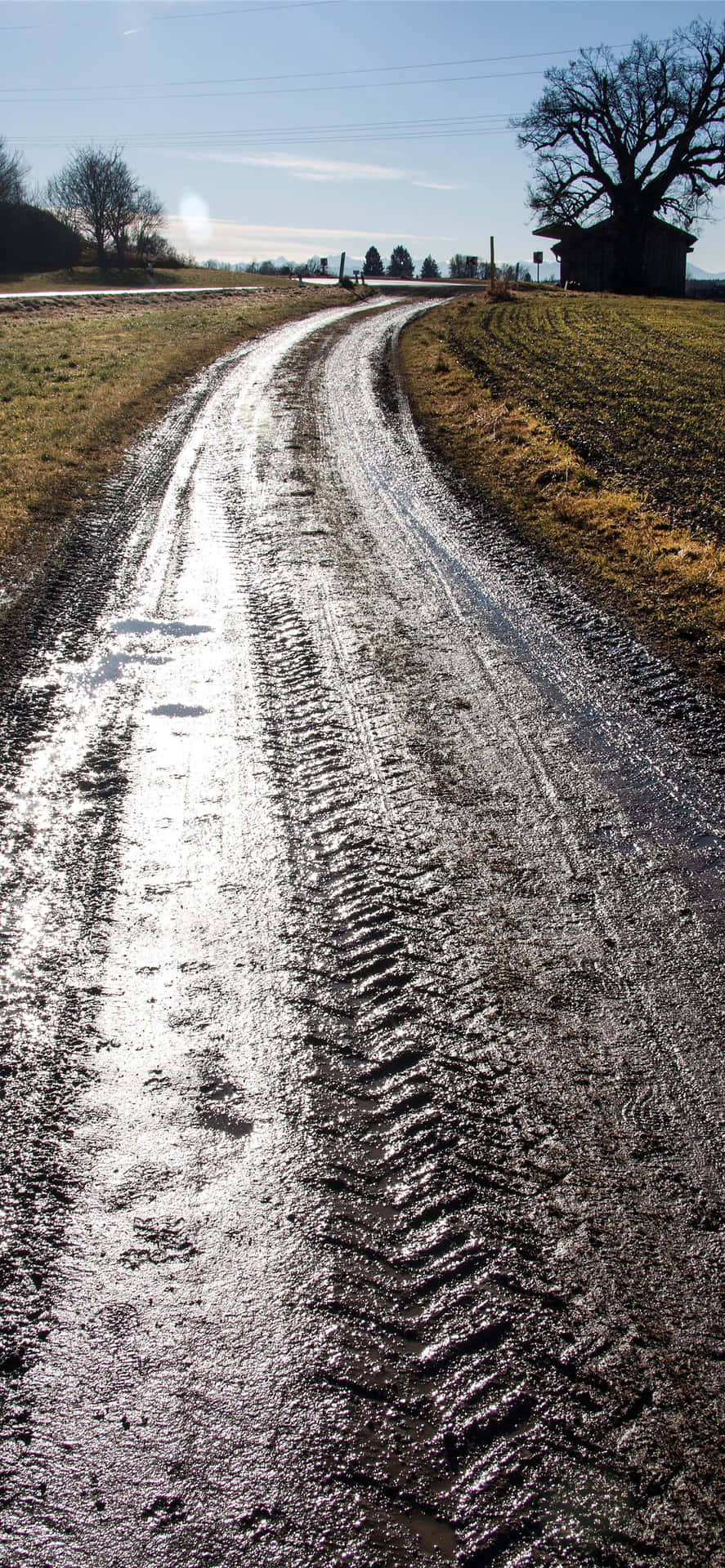 Wet Road Dirty Mud Tire Tracks