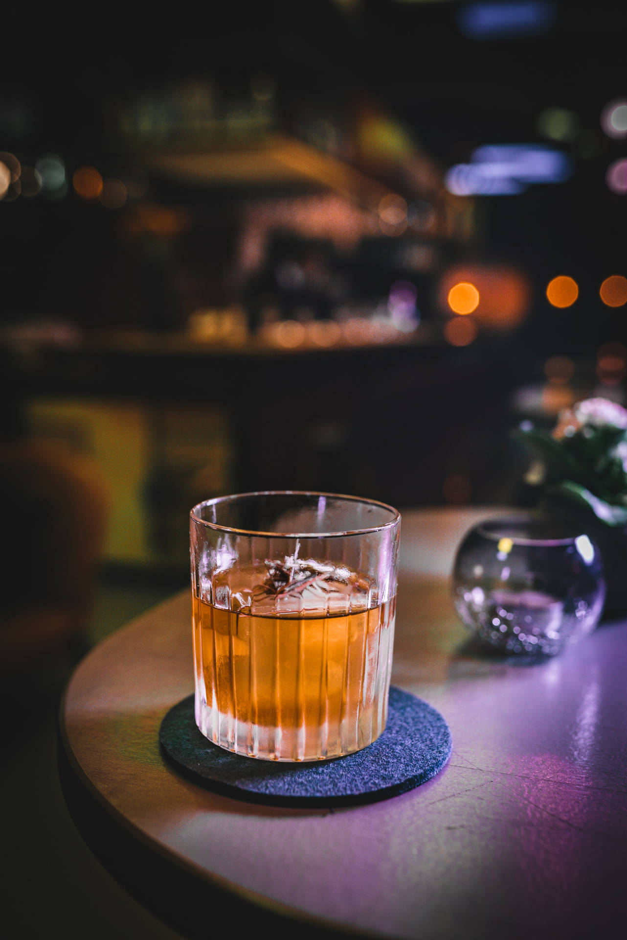 Whiskey Glass On Coaster Background