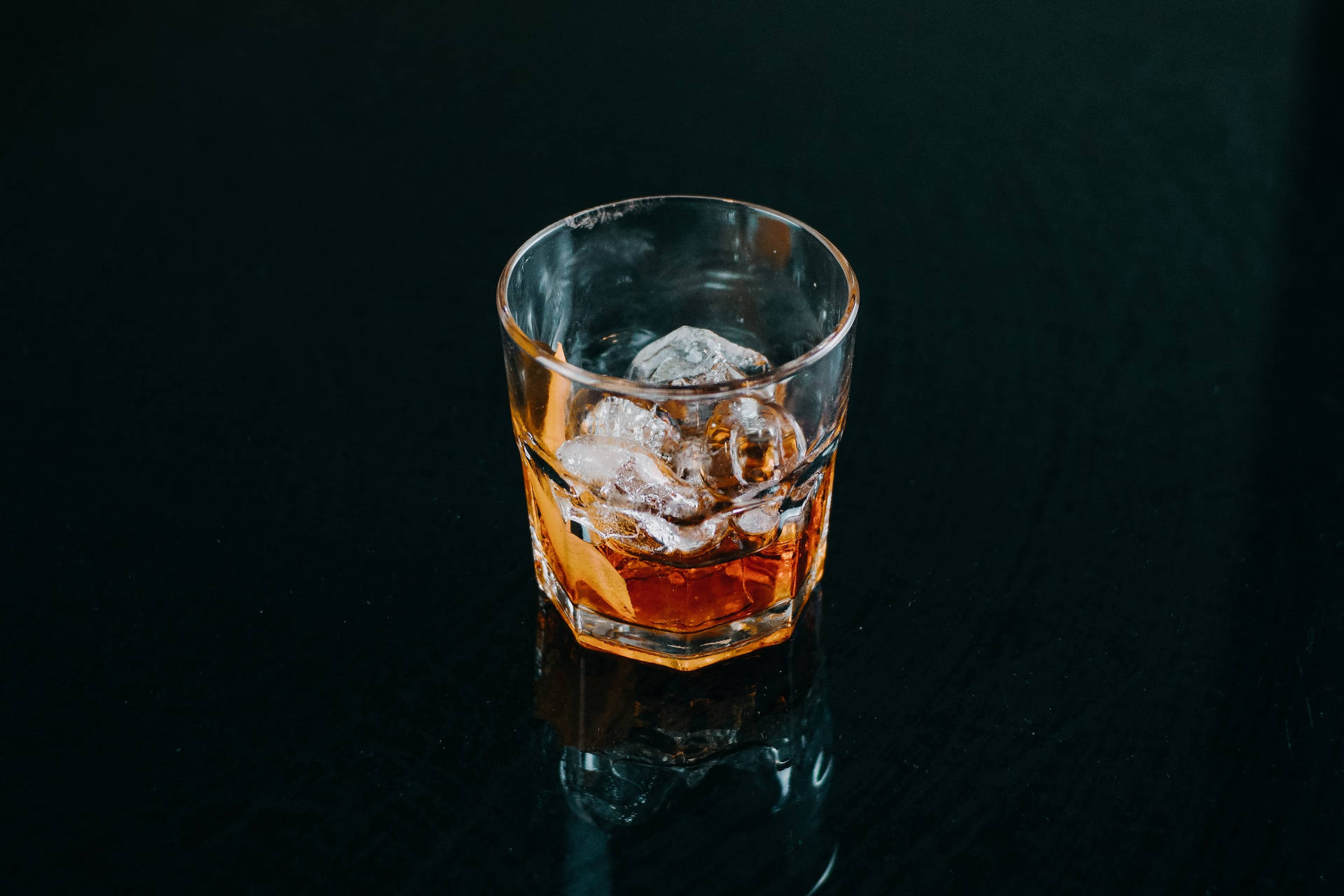 Whiskey Glass With Ice Cubes Background