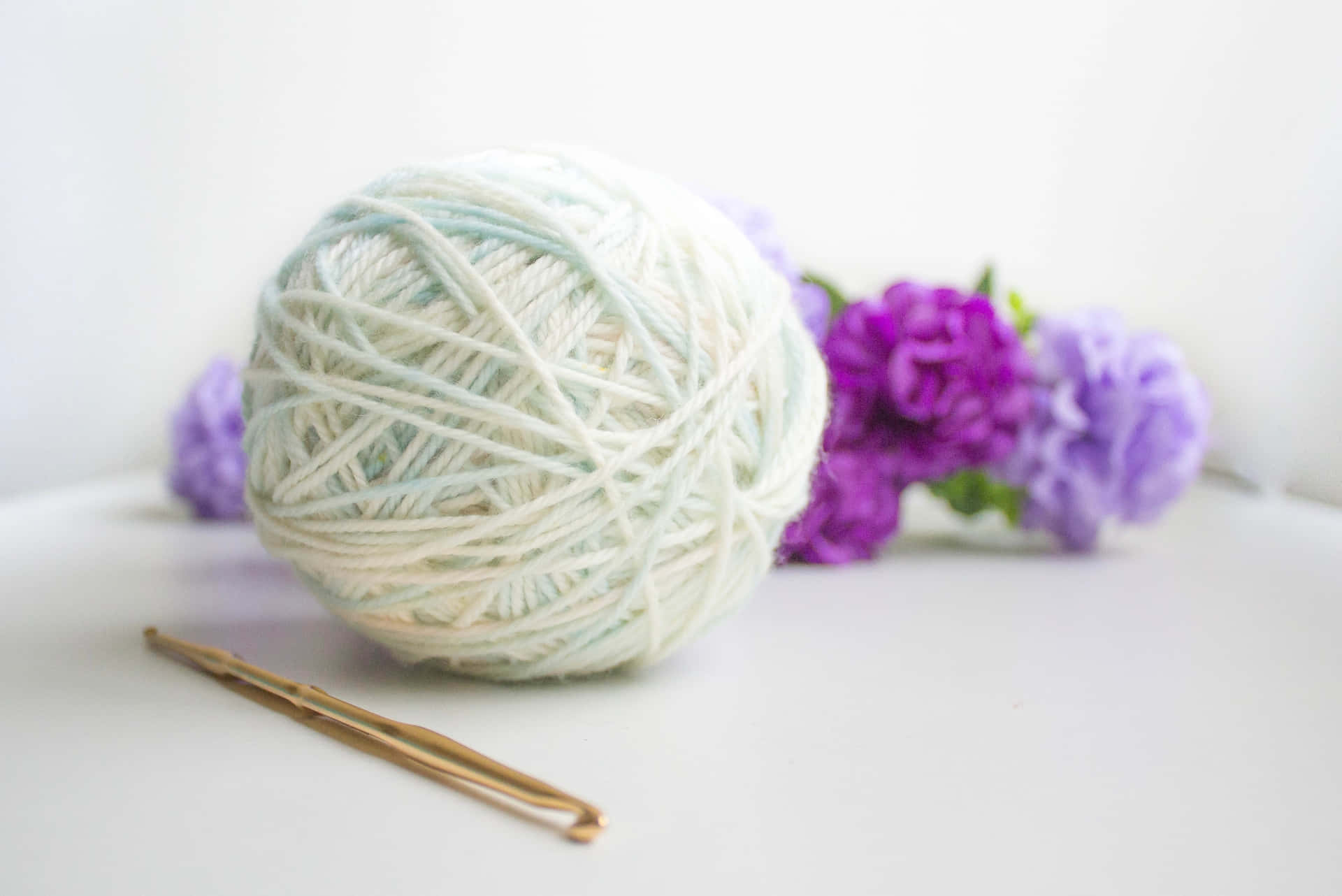 White Ball Of Knitting Wool Background