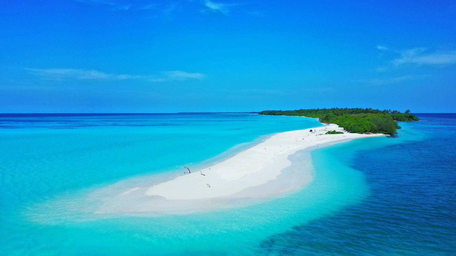 White Beach And Blue Sky Background