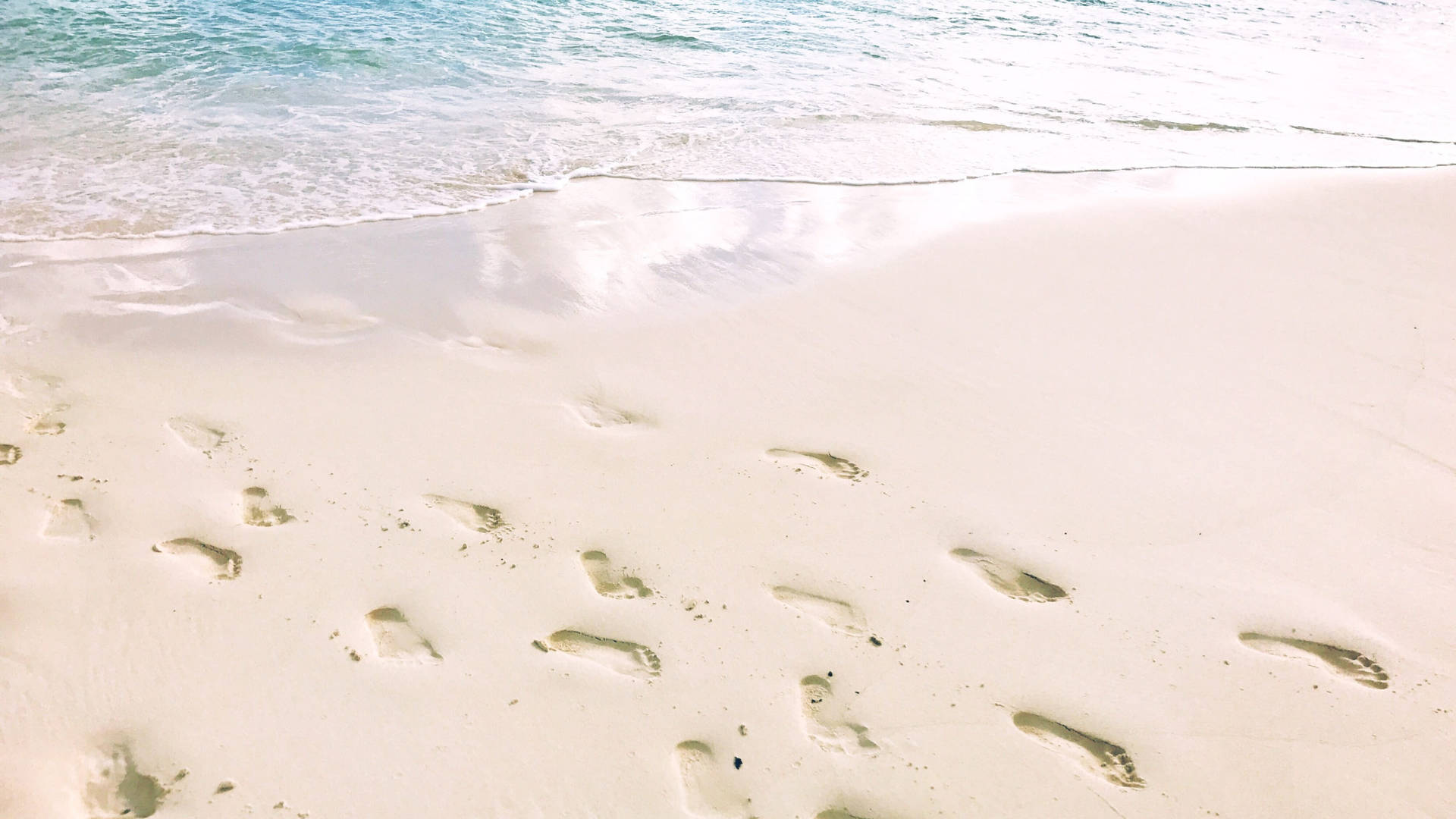 White Beach Footprints Background