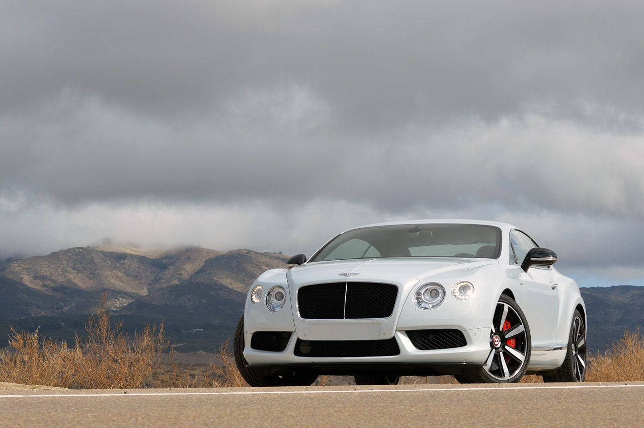 White Bentley Continental Gt Dark Sky Background