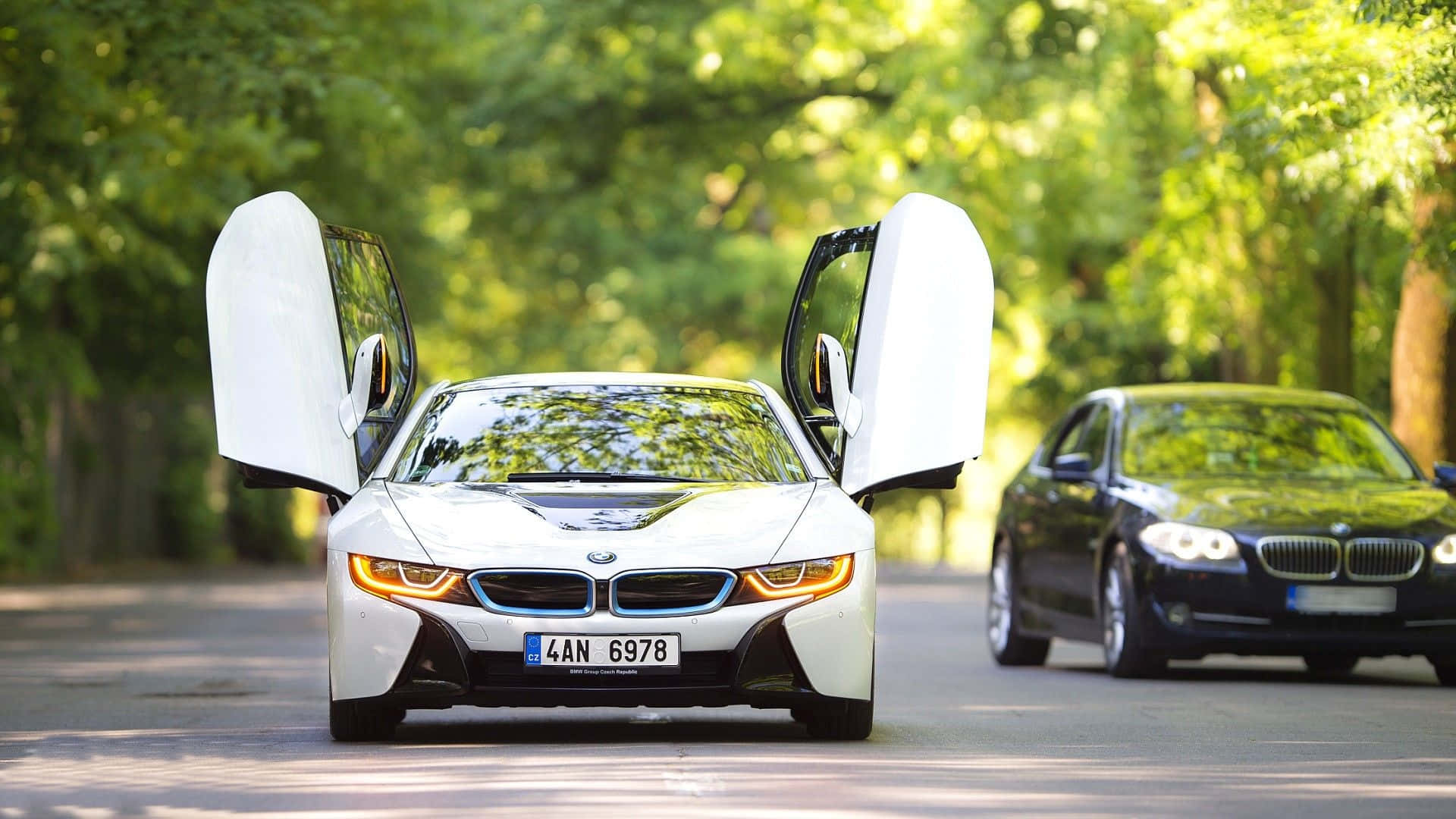 White Bmw Car With Gull-wing Doors
