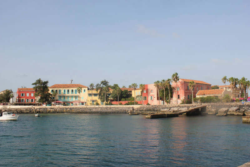 White Boat In Goree Sea Background