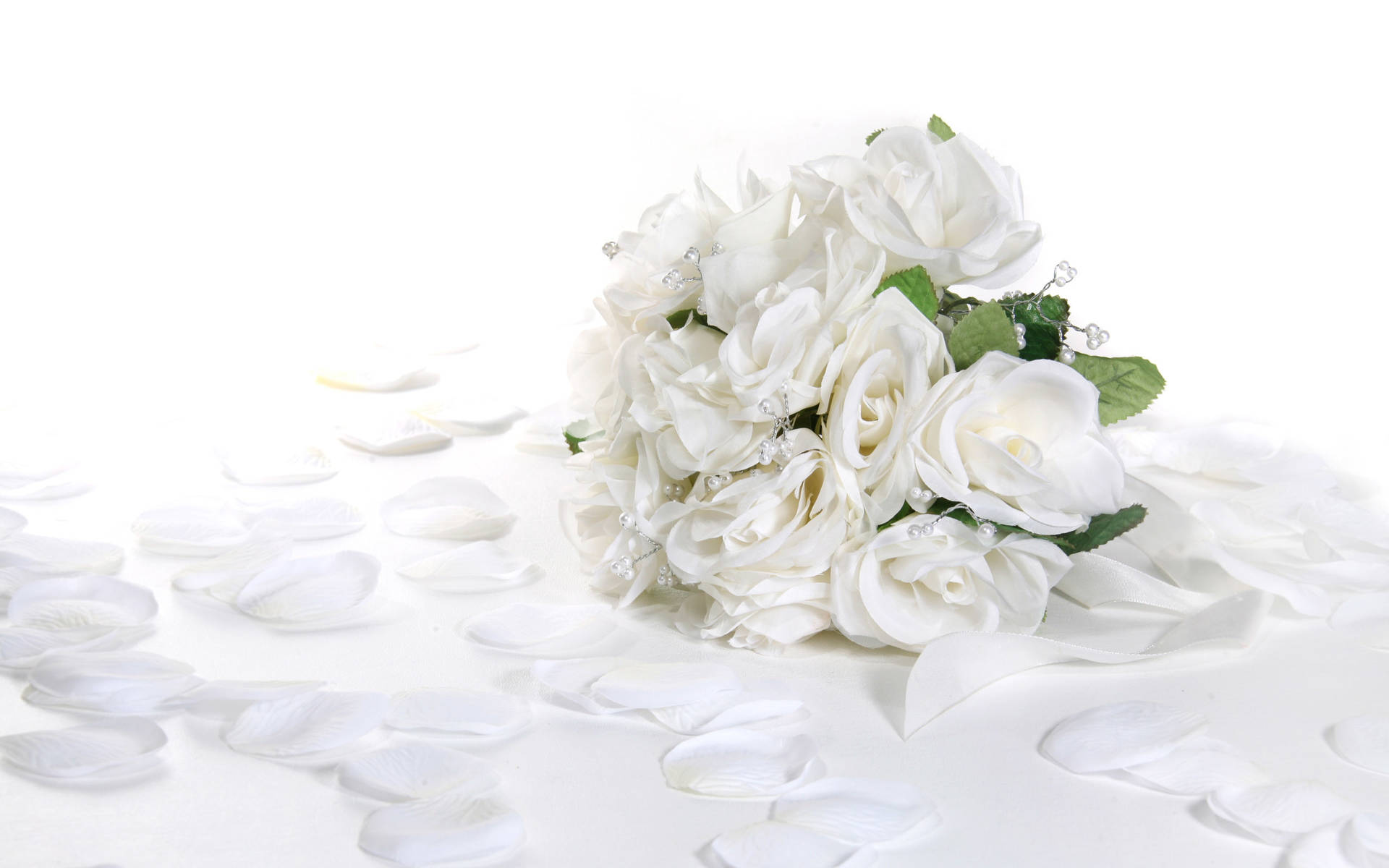 White Bridal Bouquet And Petals