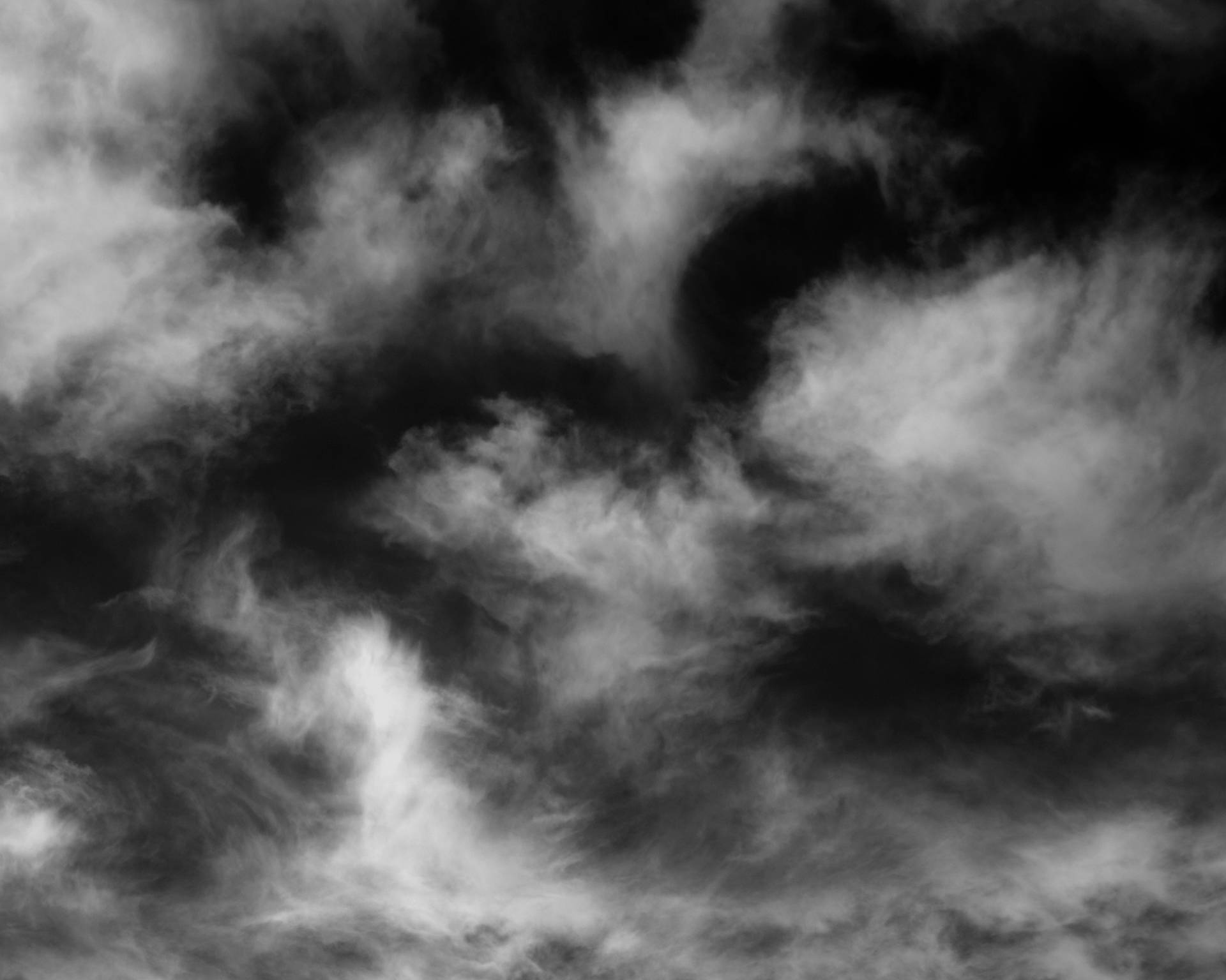 White Clouds Black Sky Background