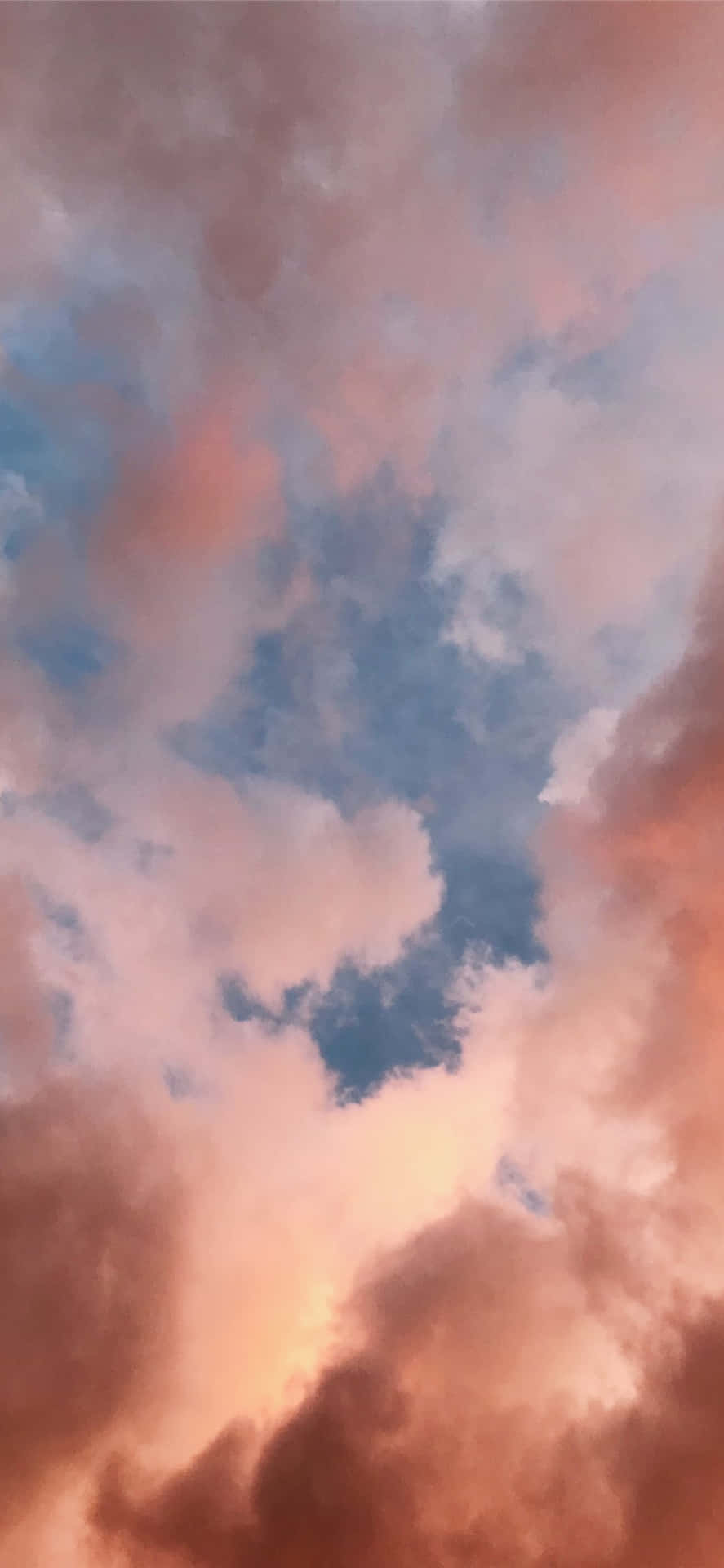 White Clouds Blanketing A Vast, Clear Blue Sky