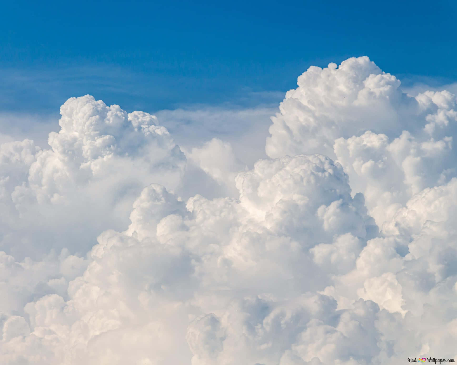 White Clouds In An Infinite Blue Sky Background