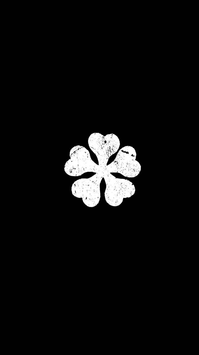 White Clover Logo In Solid Black Background