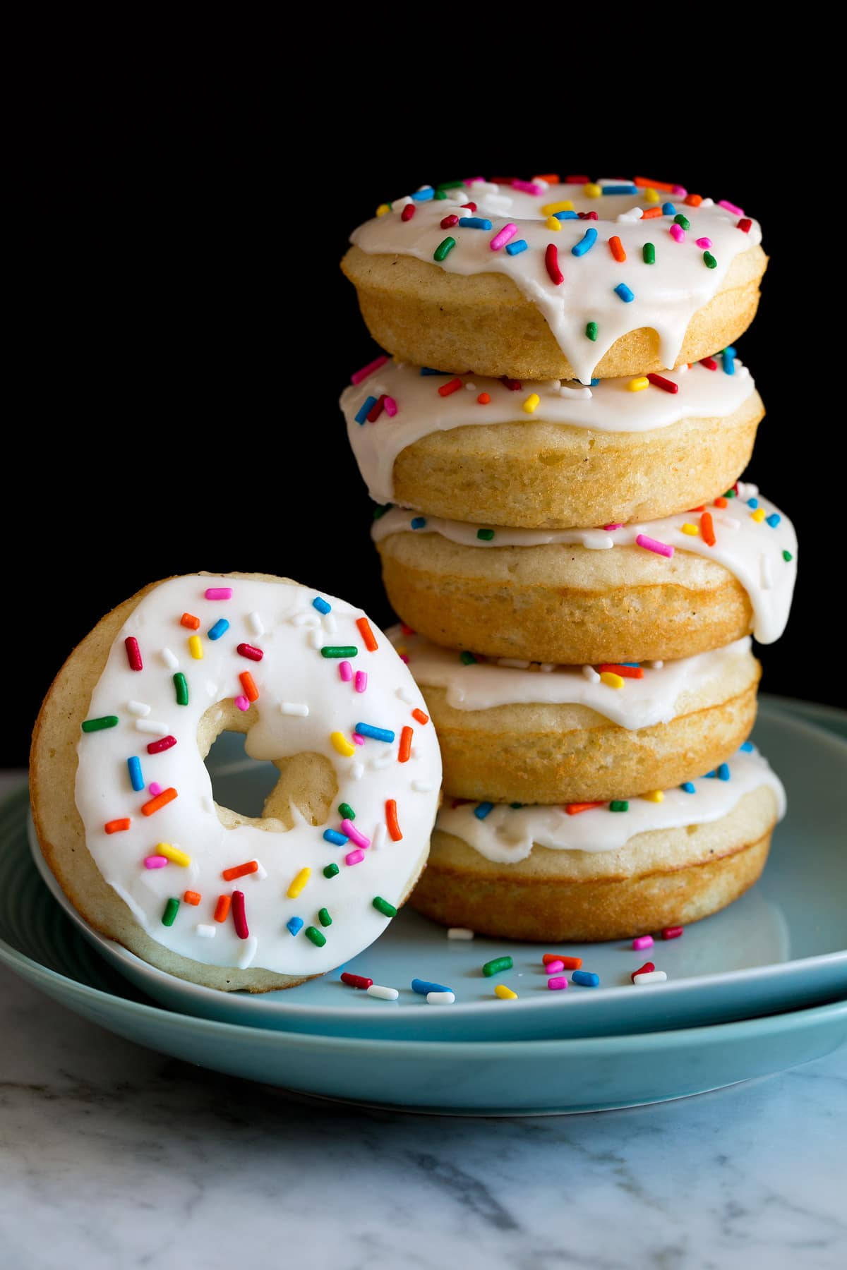 White Donuts And Sprinkles Background