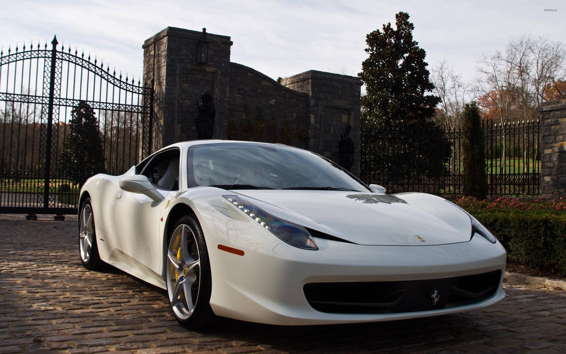 White Ferrari By The Gate Background