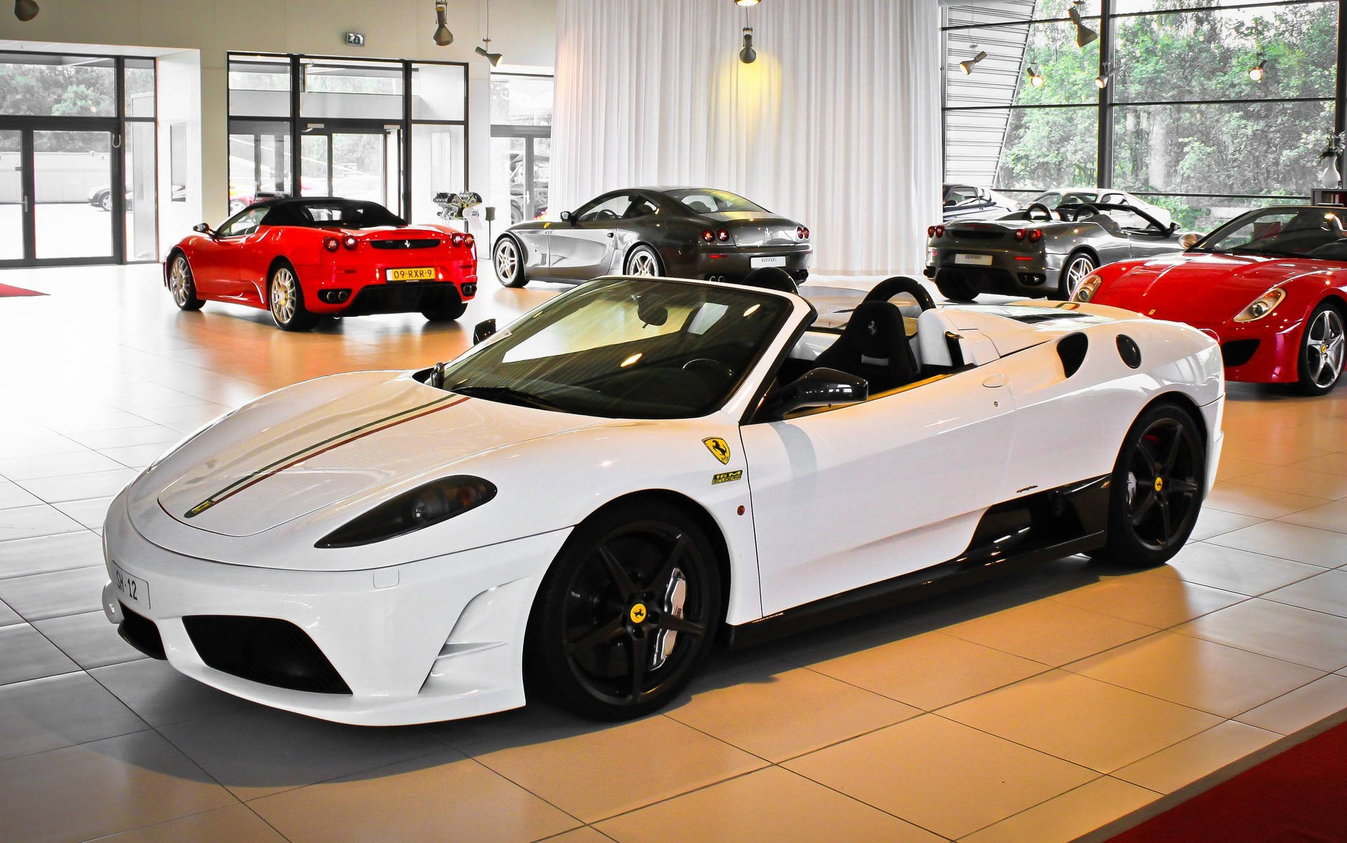 White Ferrari Car On Display Background