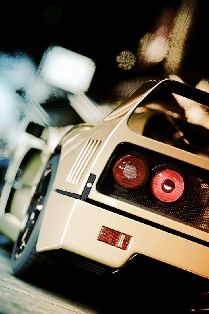 White Ferrari Iphone Yielding A Sleek And Sporty Look Background