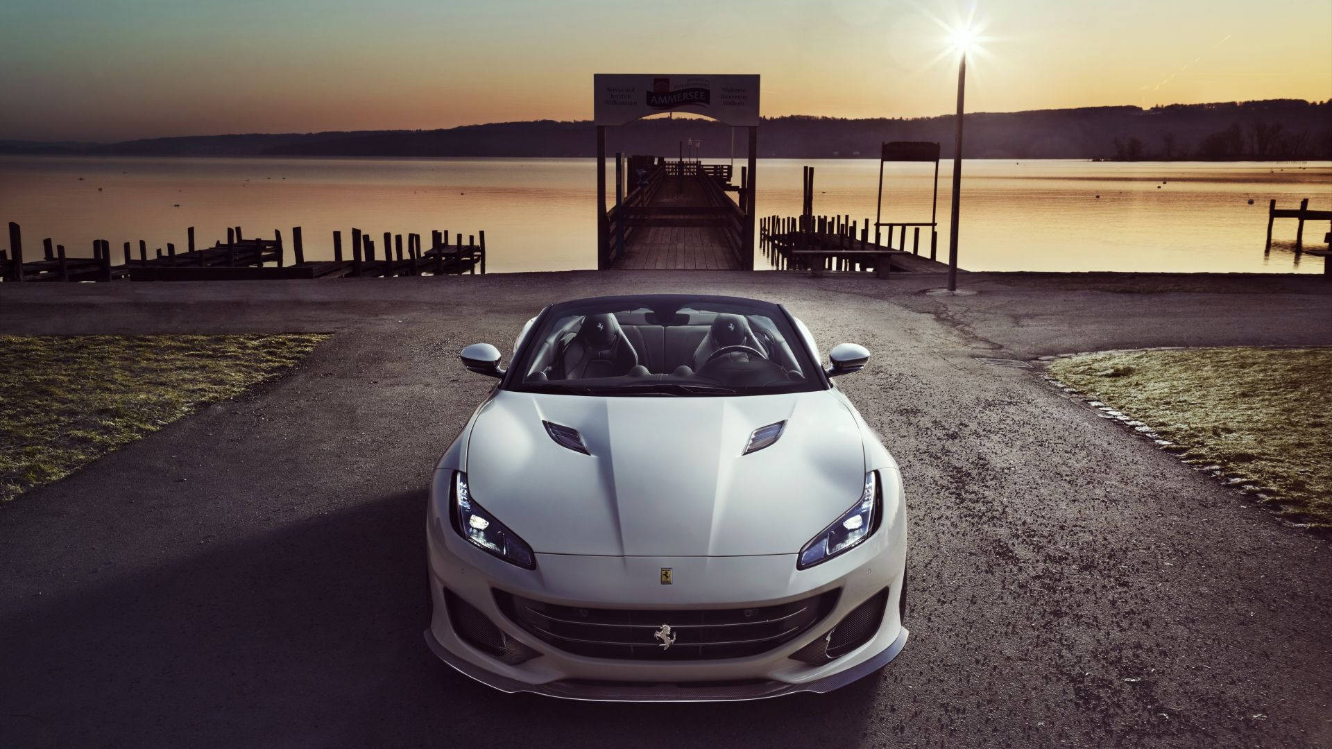 White Ferrari On Bay Background