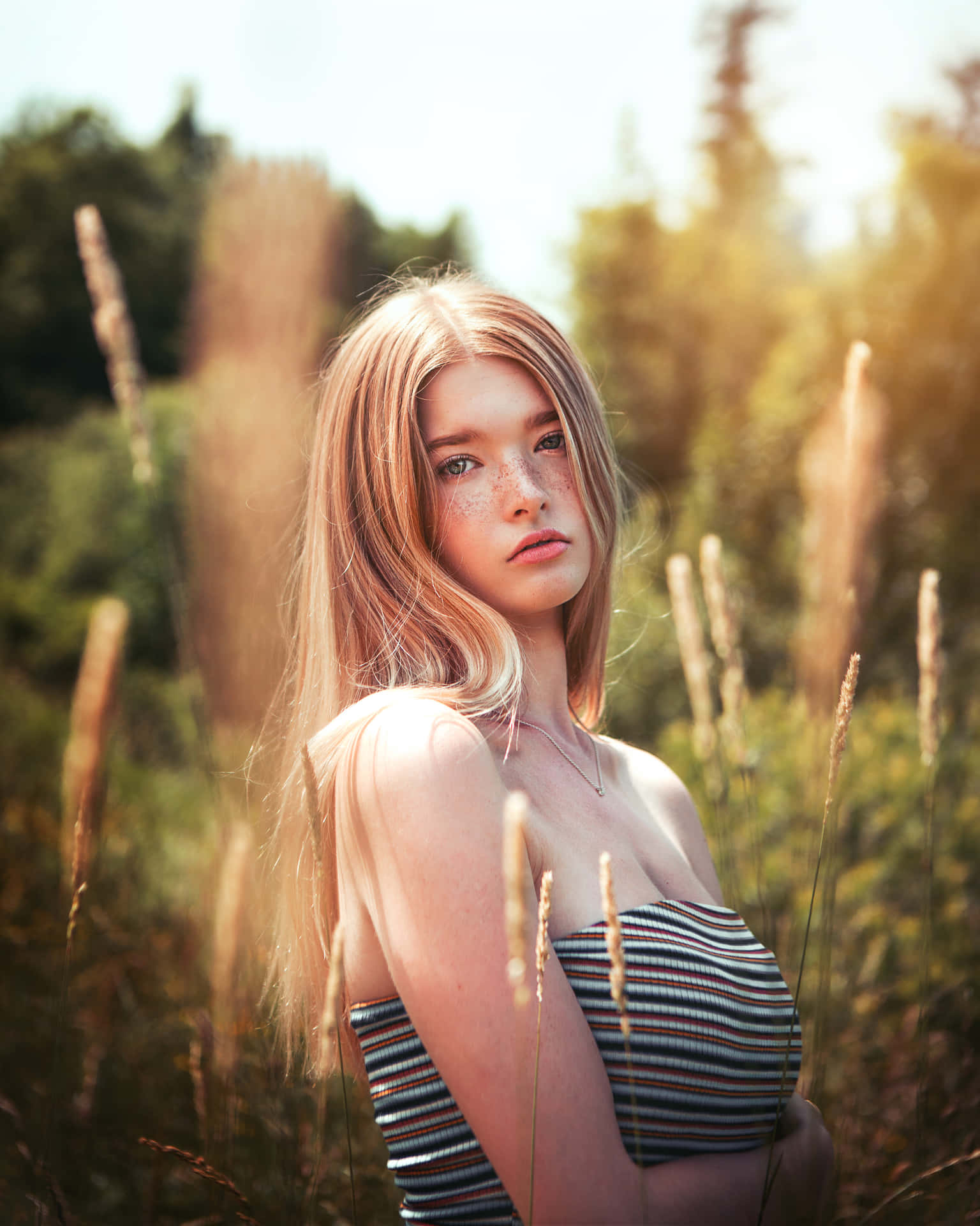 White Girl In A Striped Tube Top Background