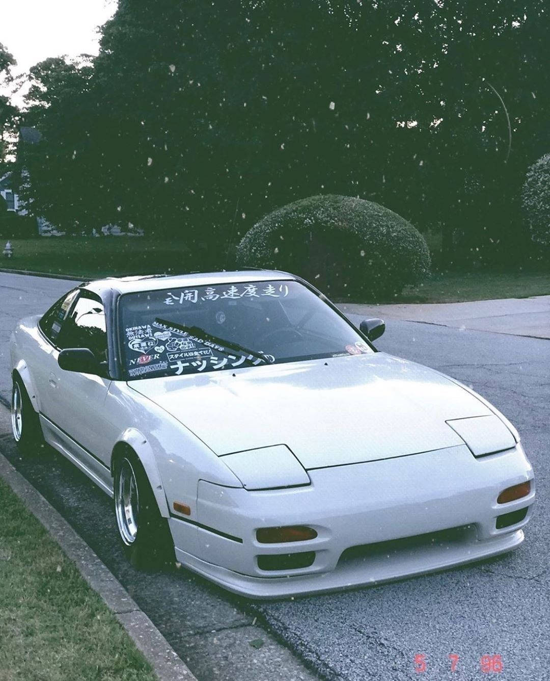 White Jdm Car Parked On Street Background