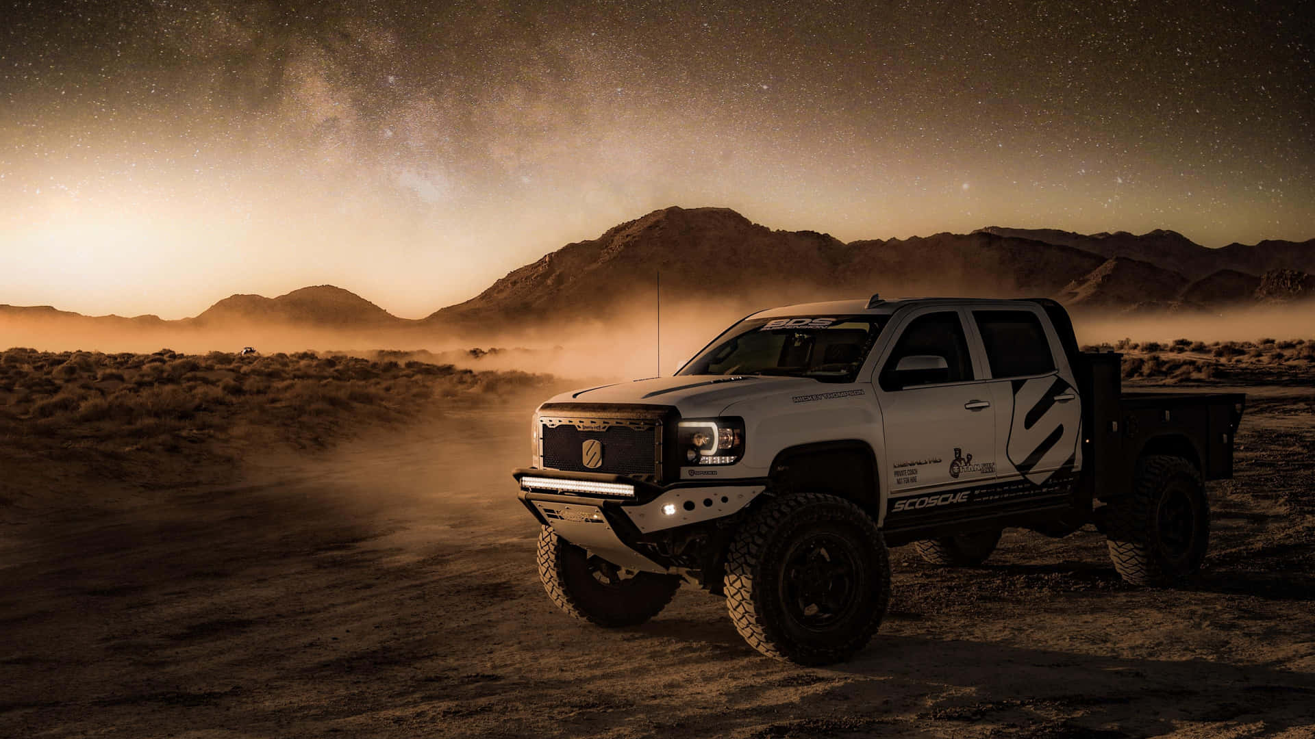 White Lifted Truck In The Dessert Background