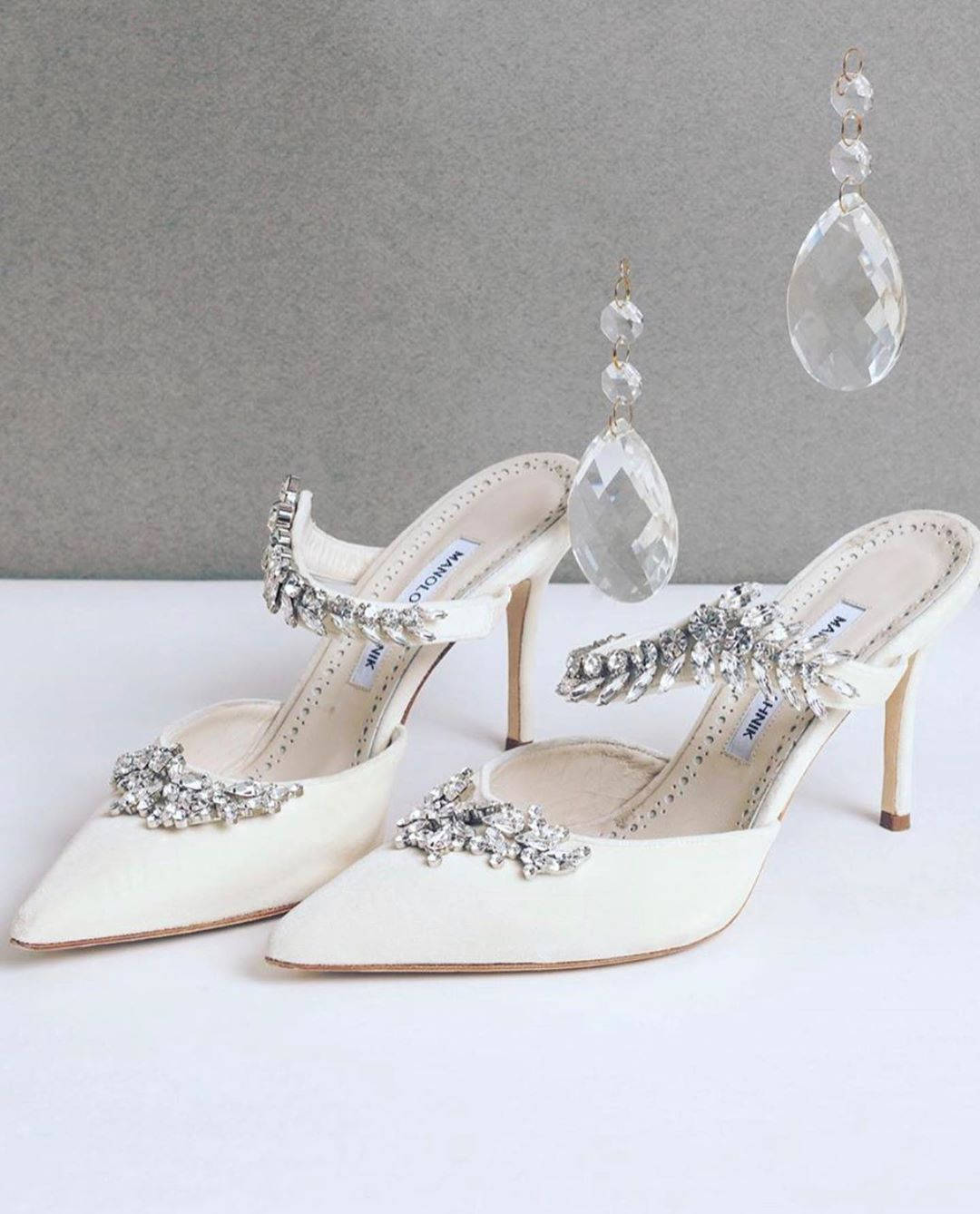 White Manolo Blahnik Stilettos Background