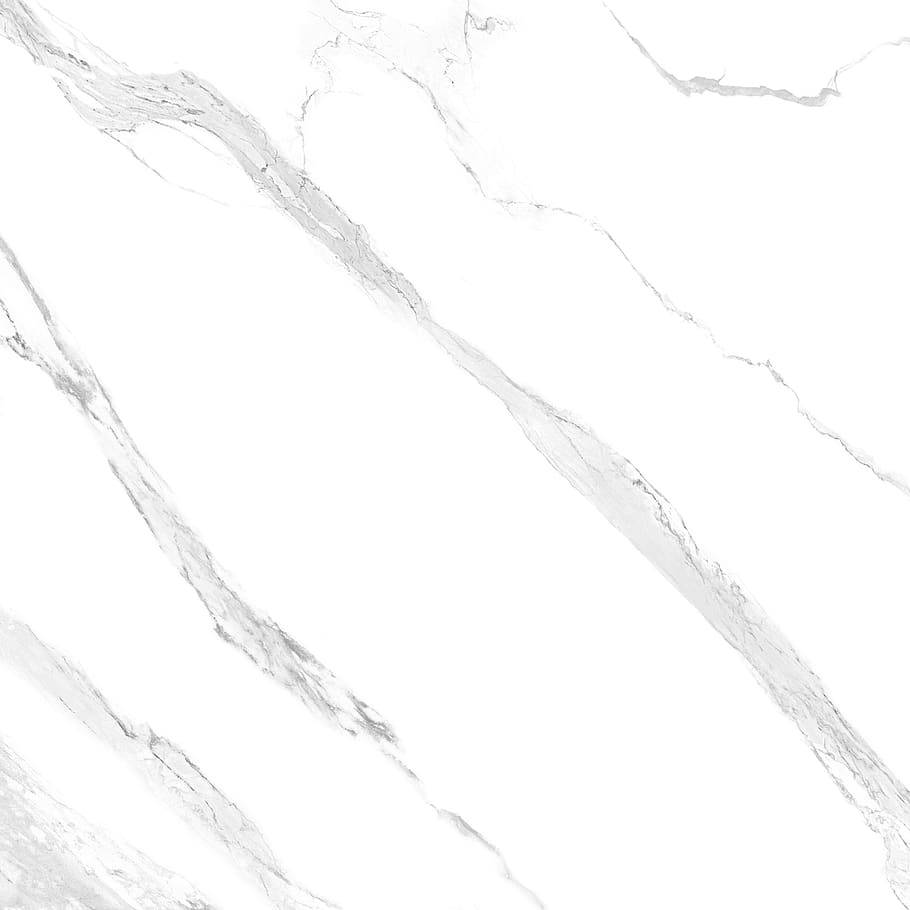 White Marble Tile With A White Background Background