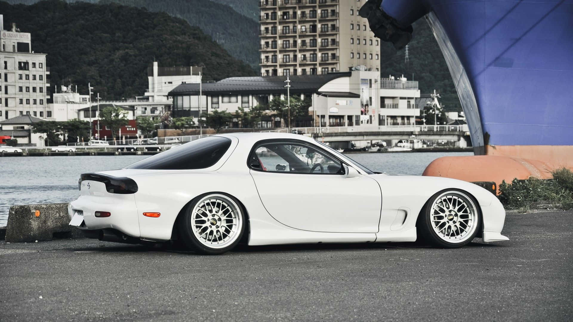 White Mazda Rx 7 By The River