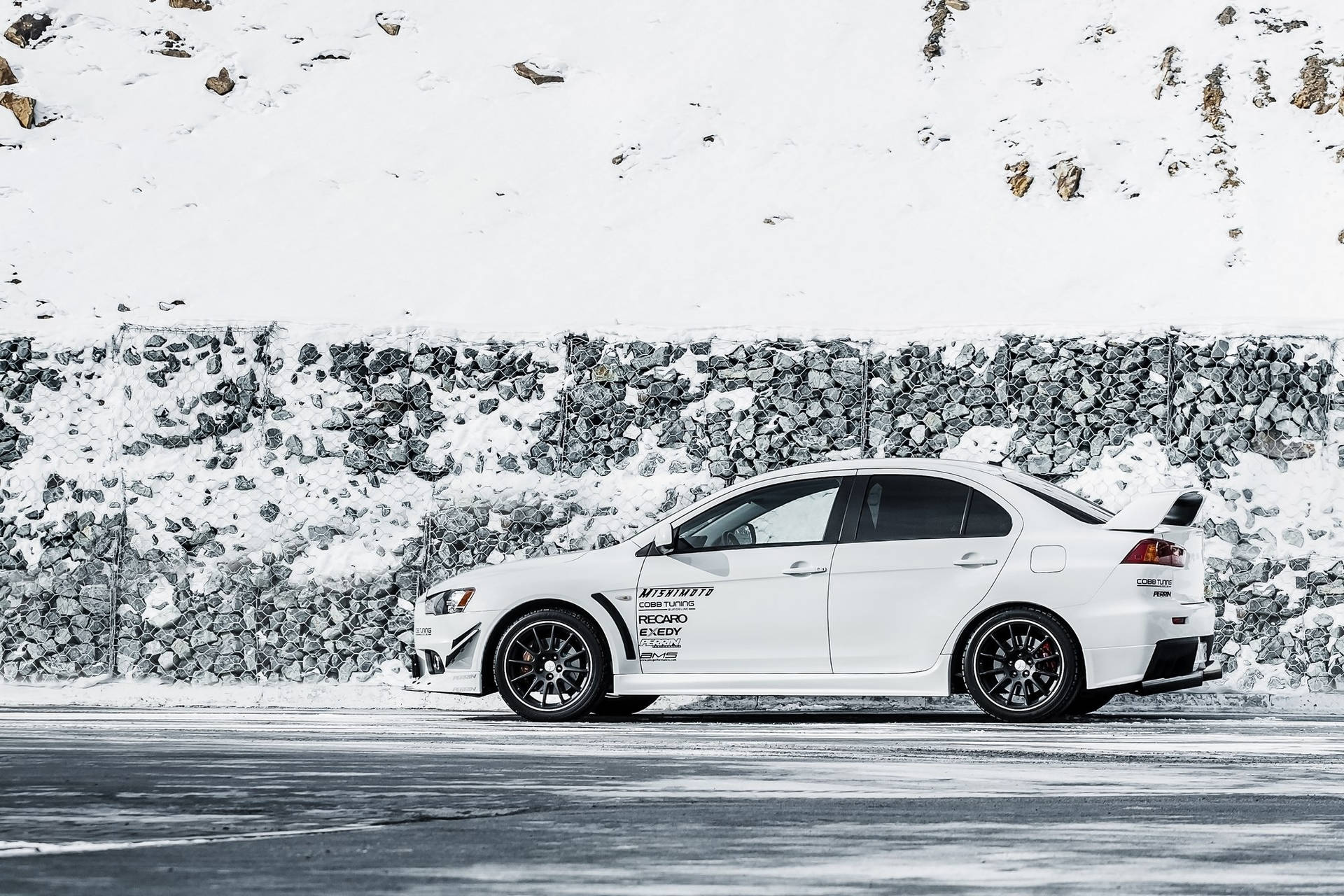 White Mitsubishi Lancer Snow Background
